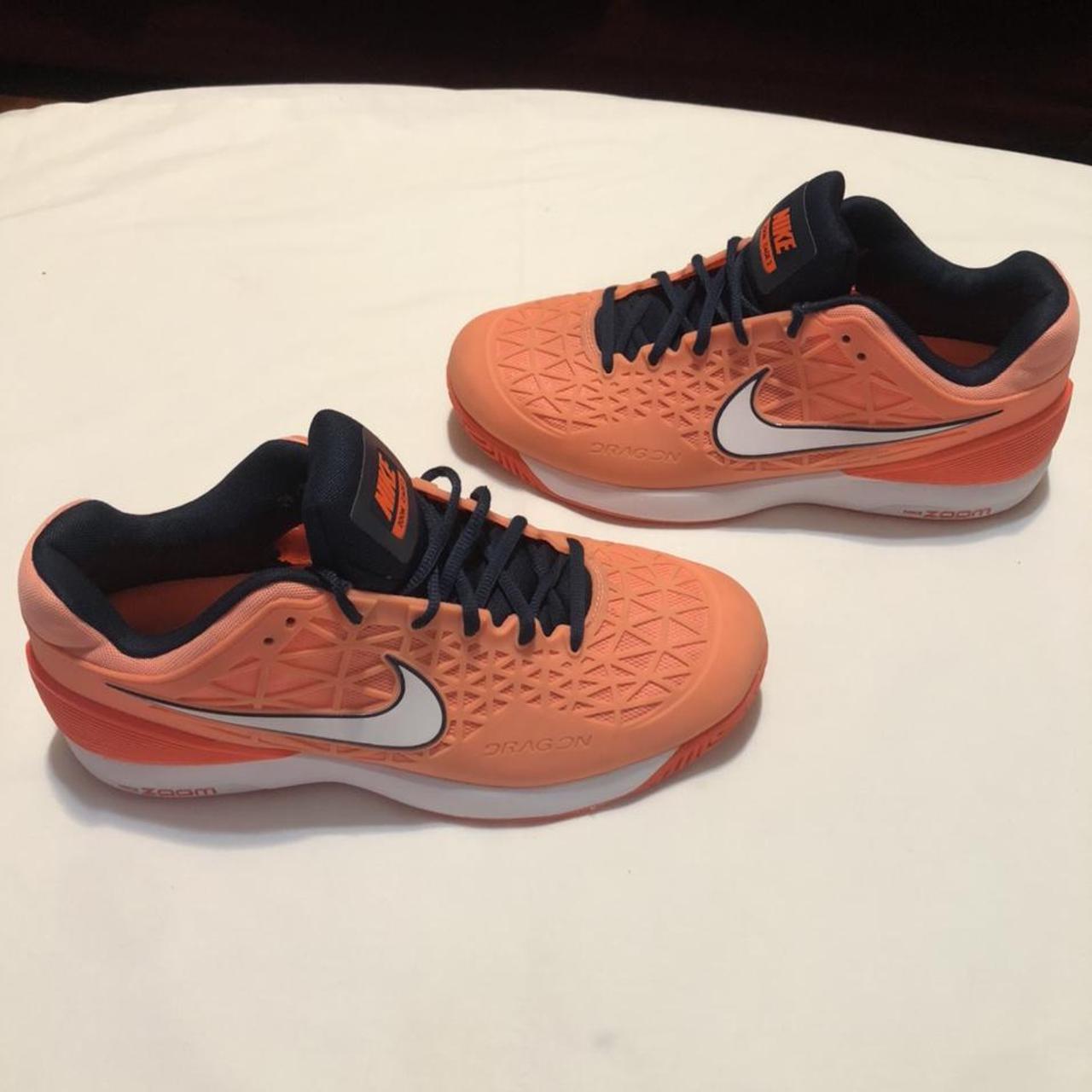 nike zoom cage 2 orange