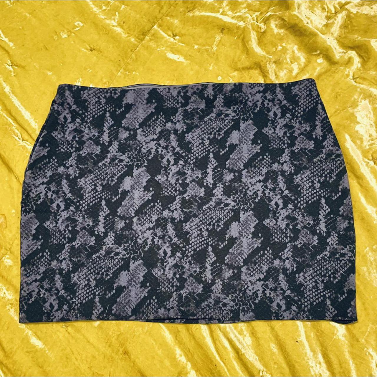 Express knit bodycon miniskirt in a black and... Depop