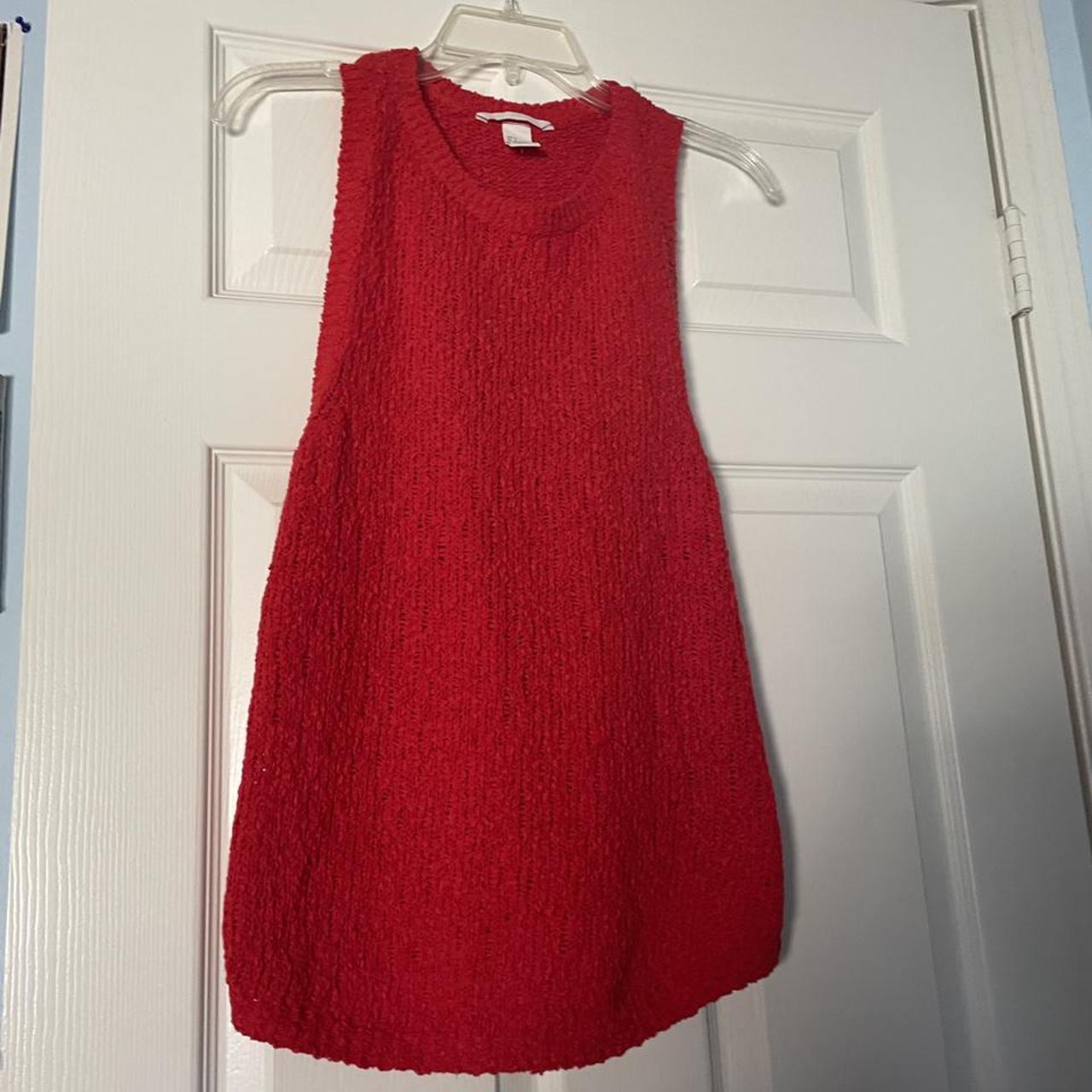 red sleeveless tunic