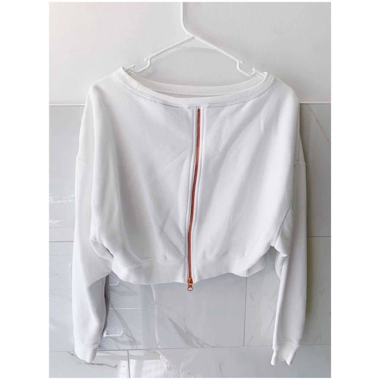 white and gold nike crop top