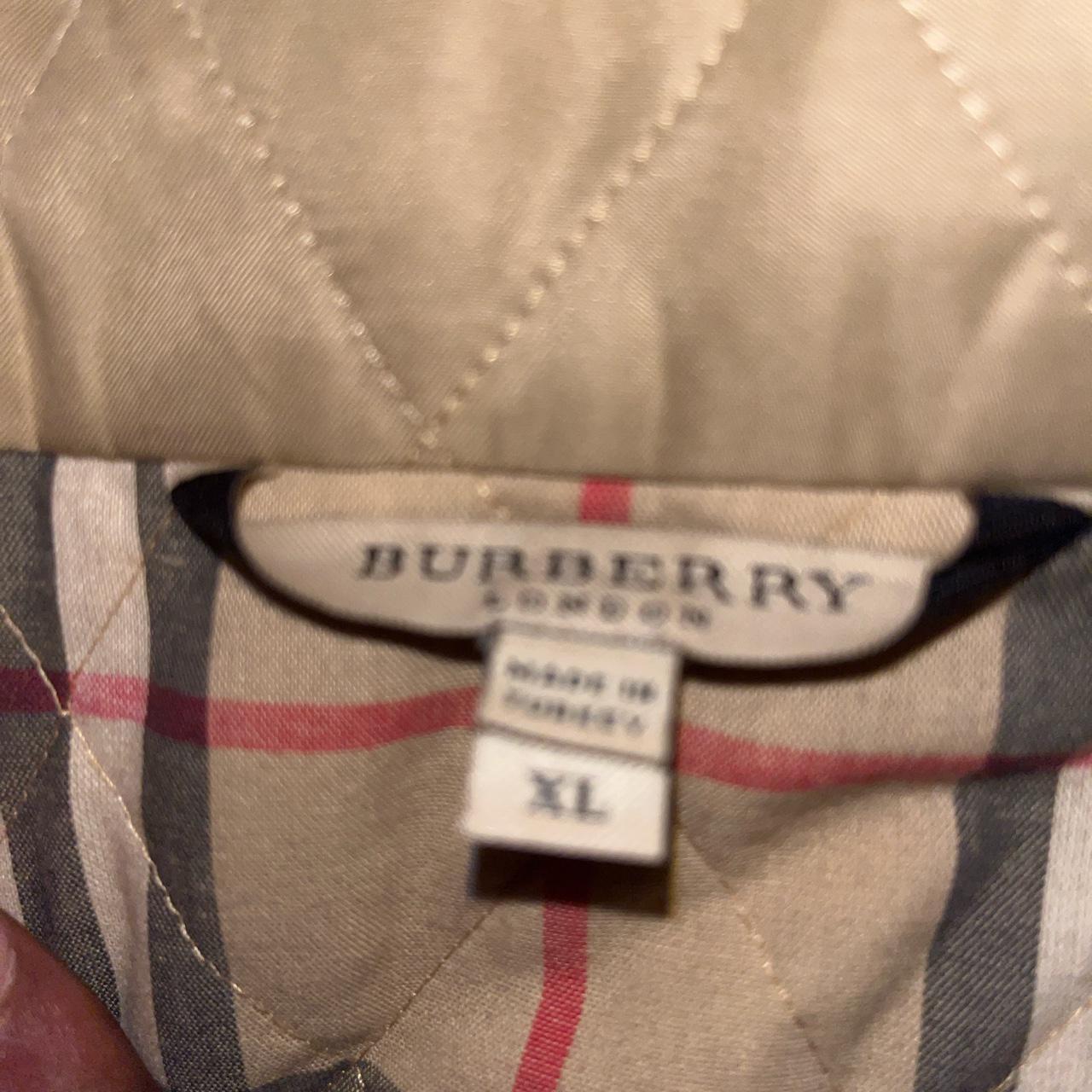Burberry Trench Tag, Label on an authentic Burberry mac tre…