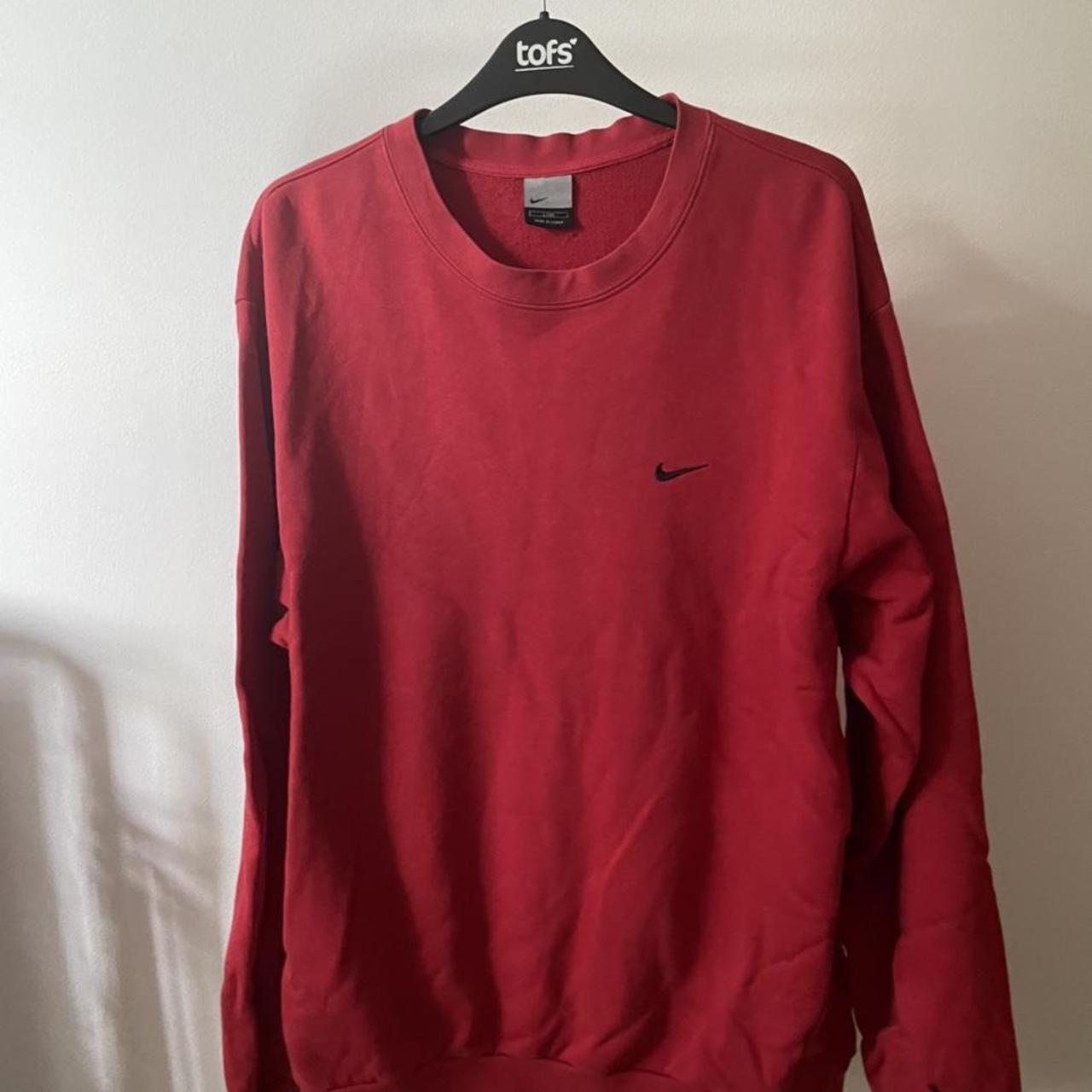 Red Nike crew neck with black tick - Depop