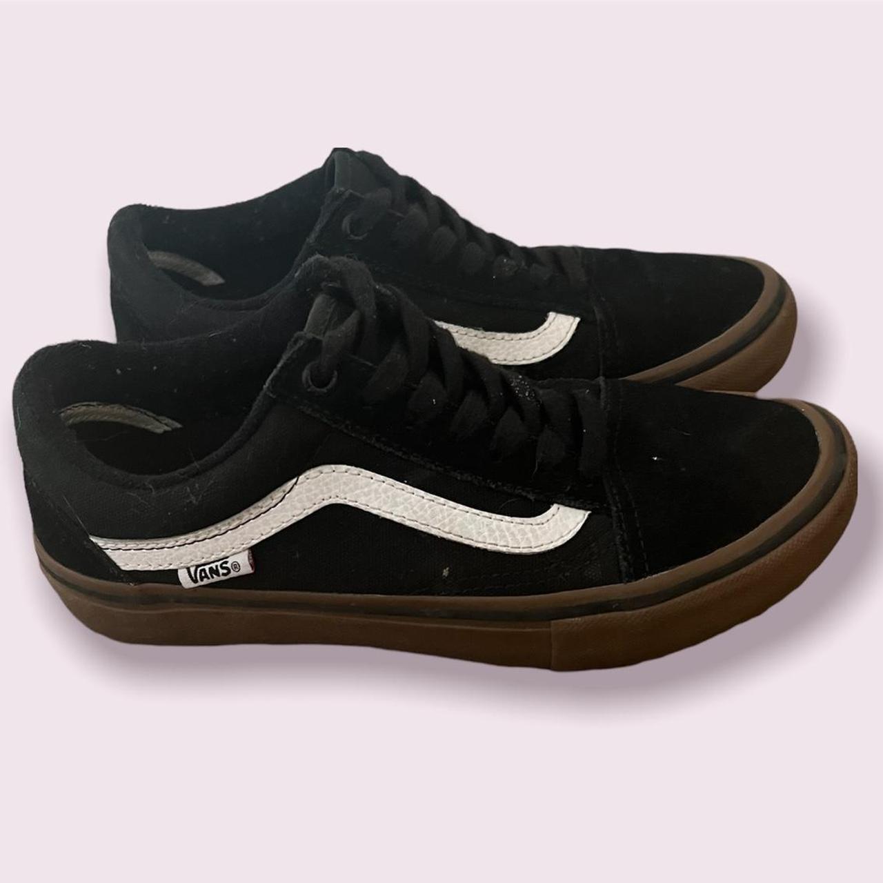 black and white vans with gum bottom