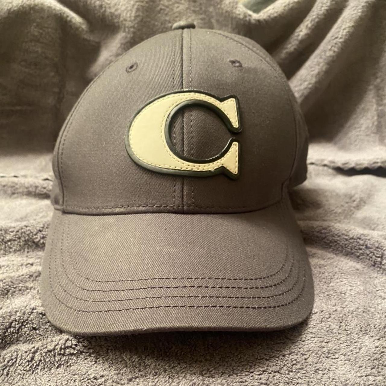 Grey selling Hat Coach