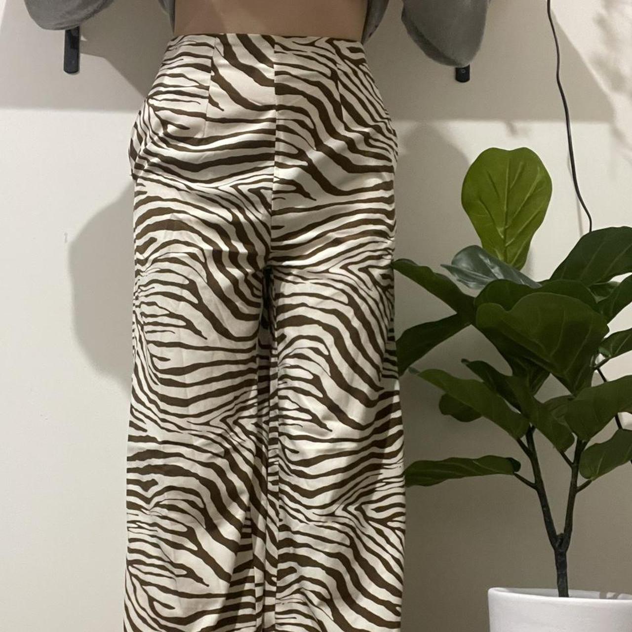 SHEIN brown zebra print pants flare leg very thin... Depop