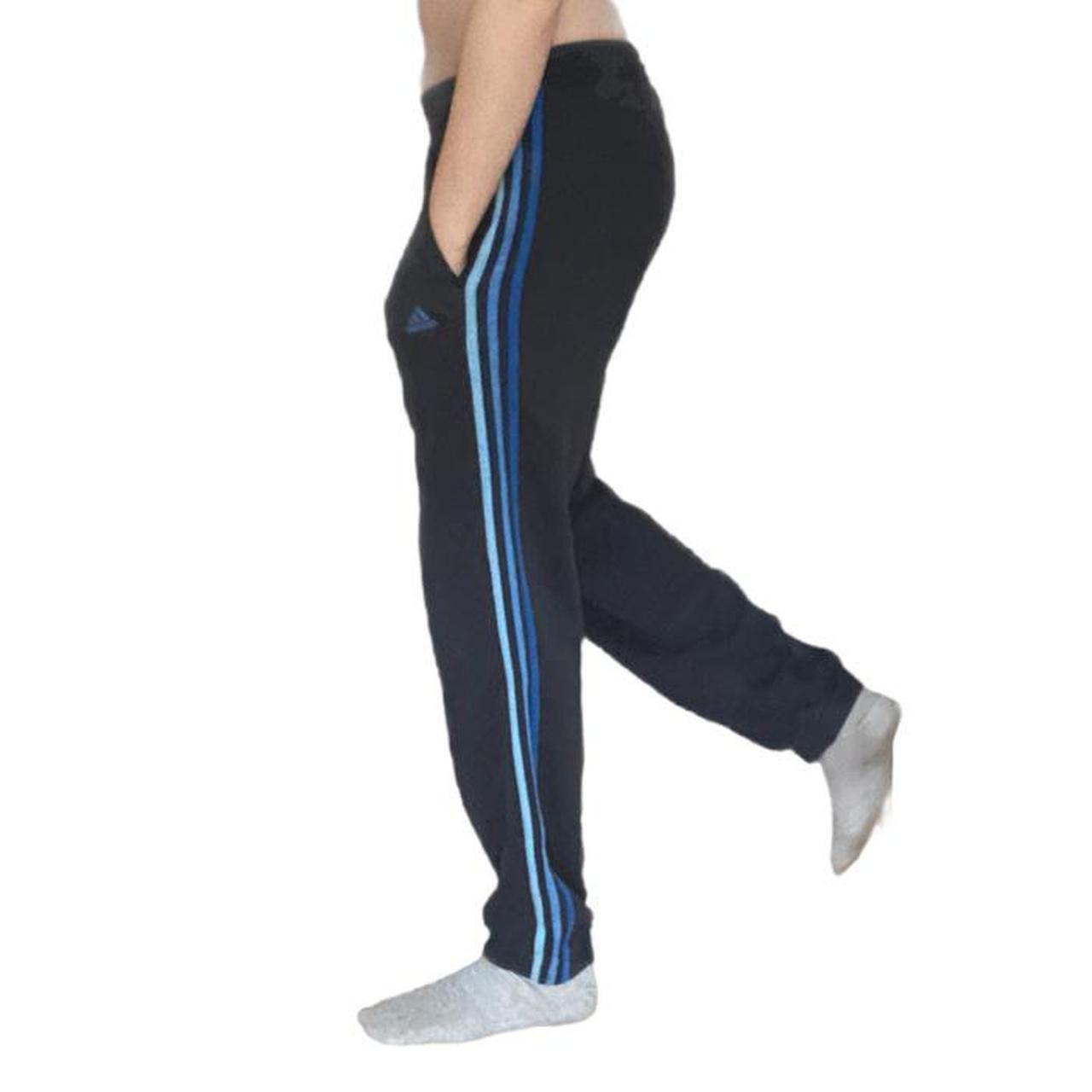 vintage Adidas tracksuit bottoms in a navy + blue... Depop