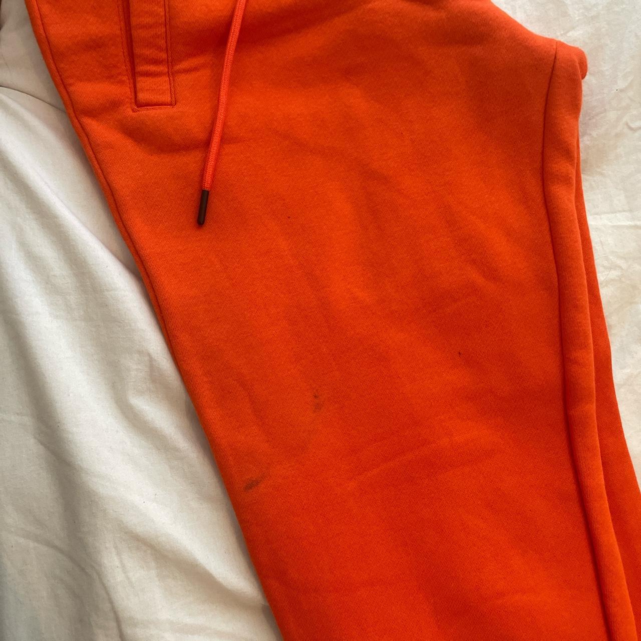 womens orange nike tracksuit