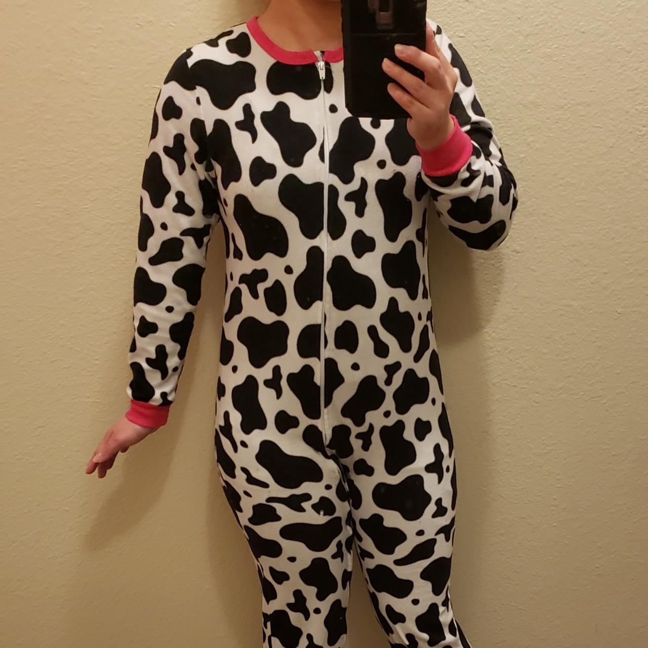 Size large in girls juniors, a cow footie pajamas... Depop