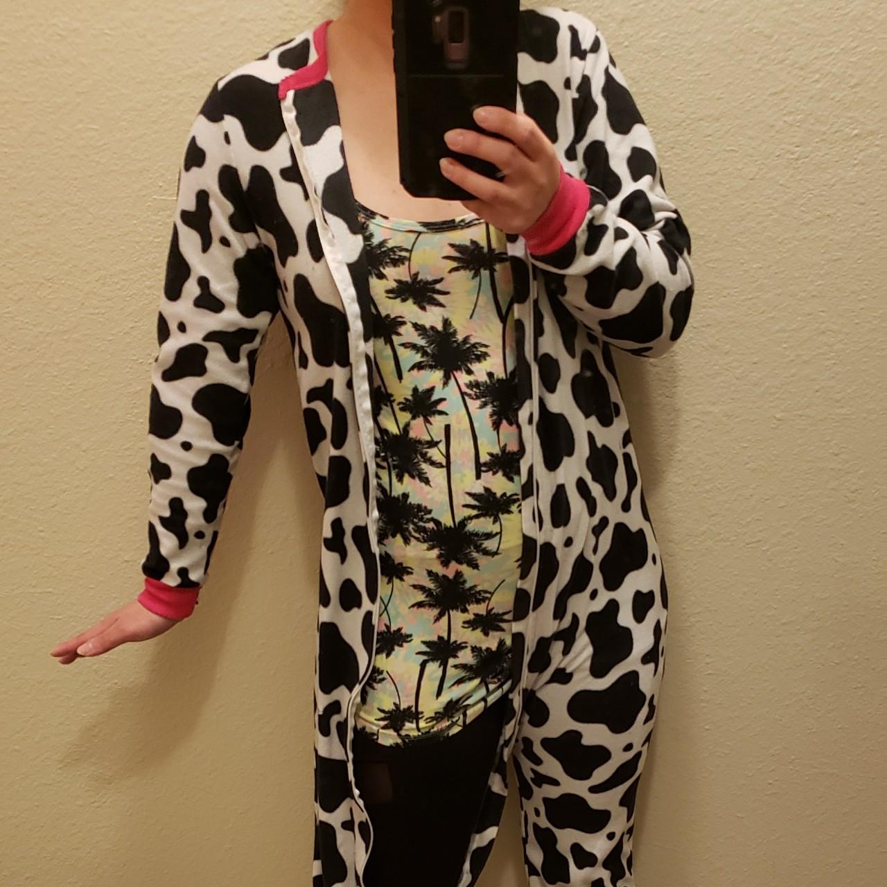 Size large in girls juniors, a cow footie pajamas... Depop
