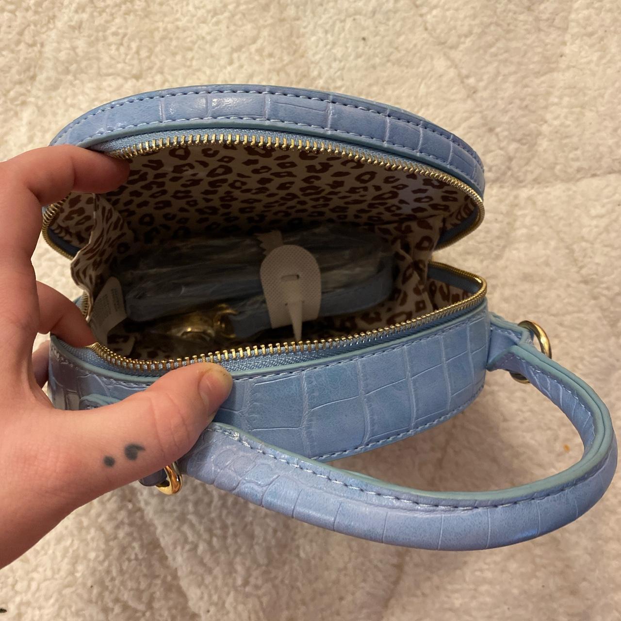 circle purse, can be hand held or - Depop