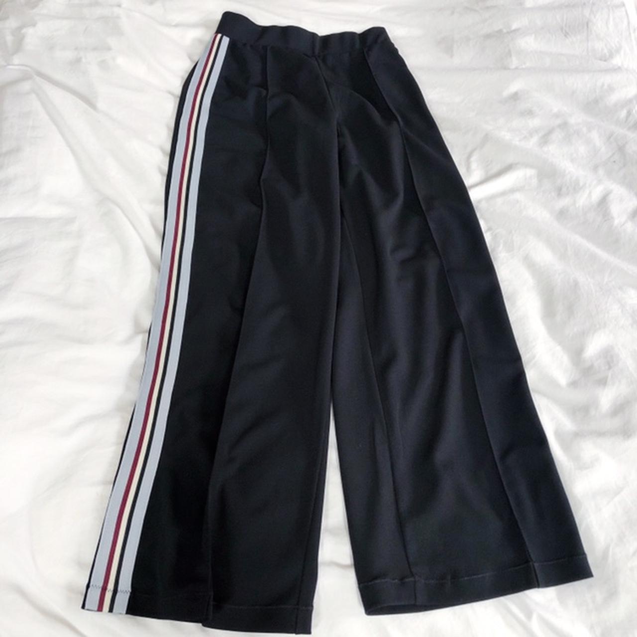 Black wide leg trousers with sporty side stripes.... - Depop