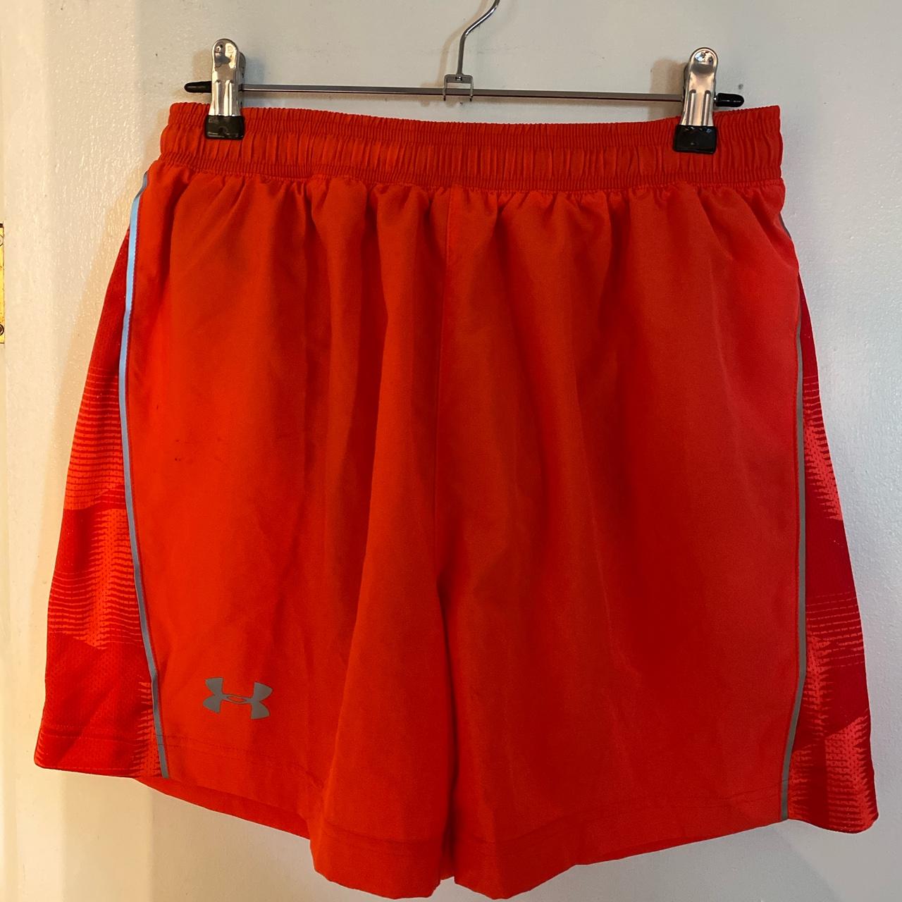 Under Armour neon orange running shorts; NWT;... Depop