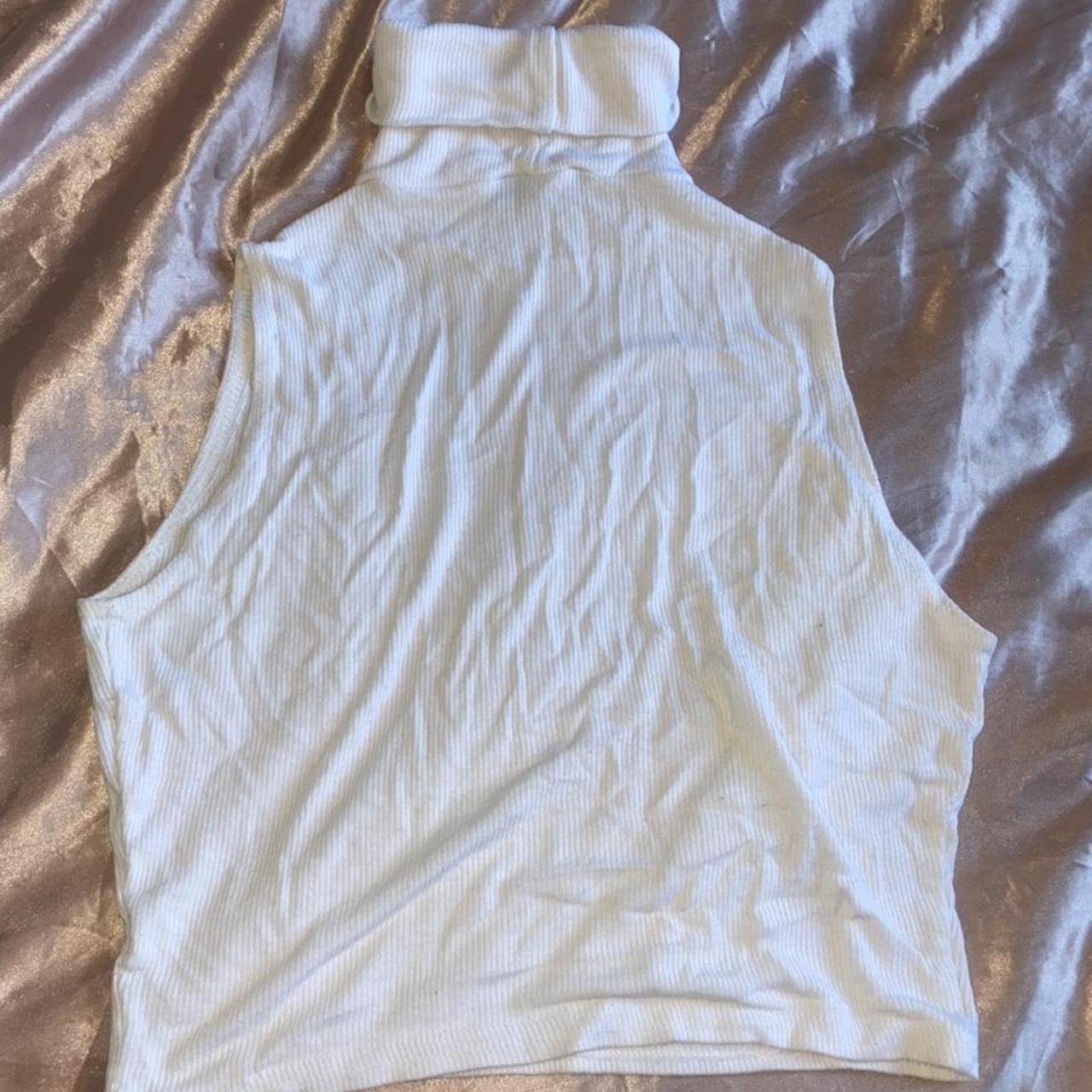 Turtle neck vest top Never worn - Depop