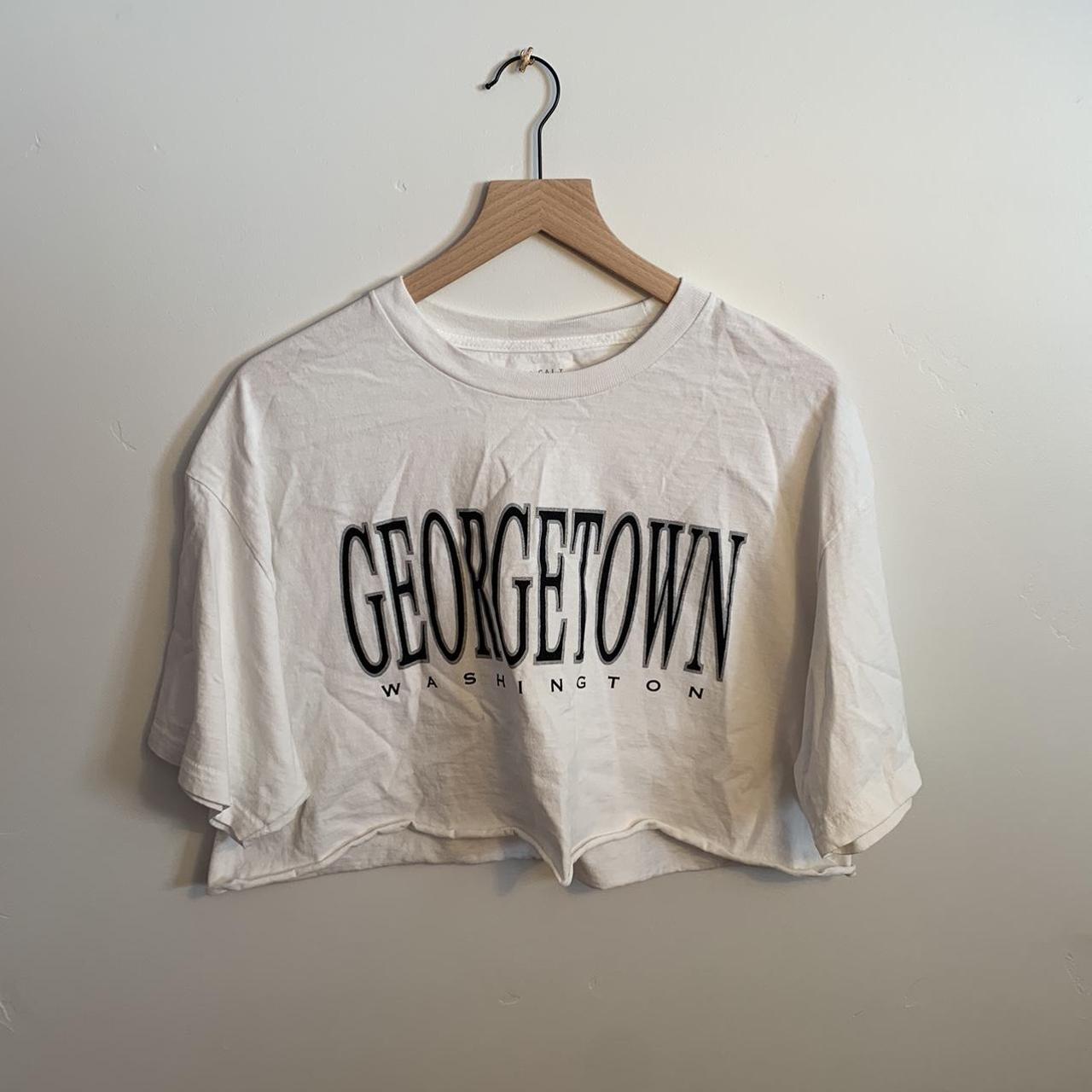brandy melville georgetown t-shirt size: one size... - Depop