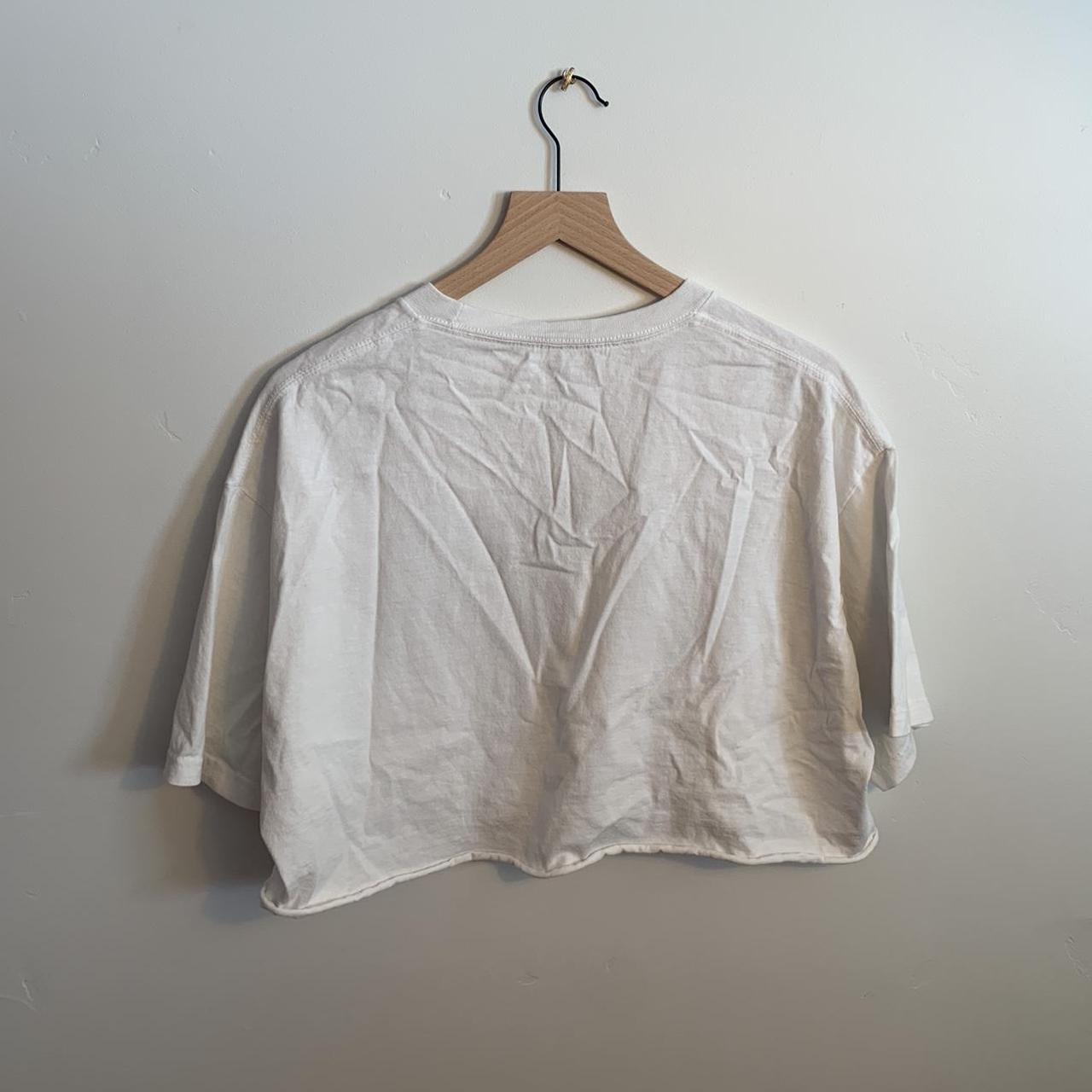 brandy melville georgetown t-shirt size: one size... - Depop