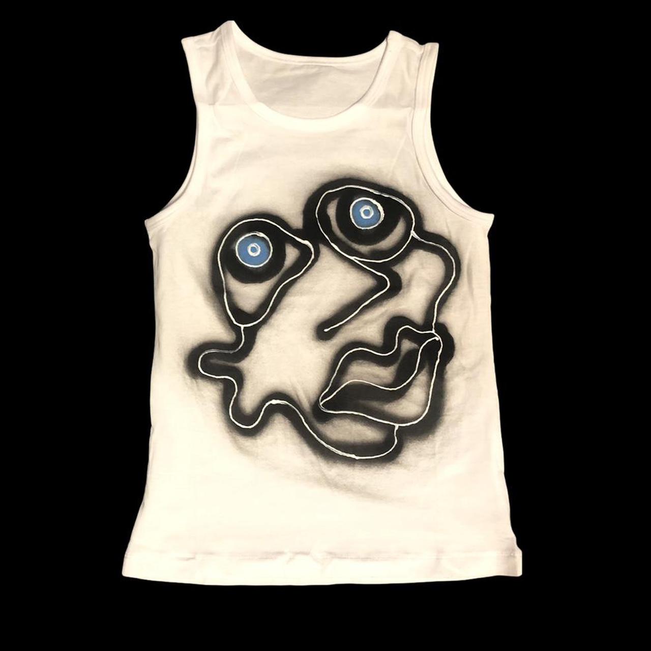 Spray paint and detail vest top made with all fabric... Depop