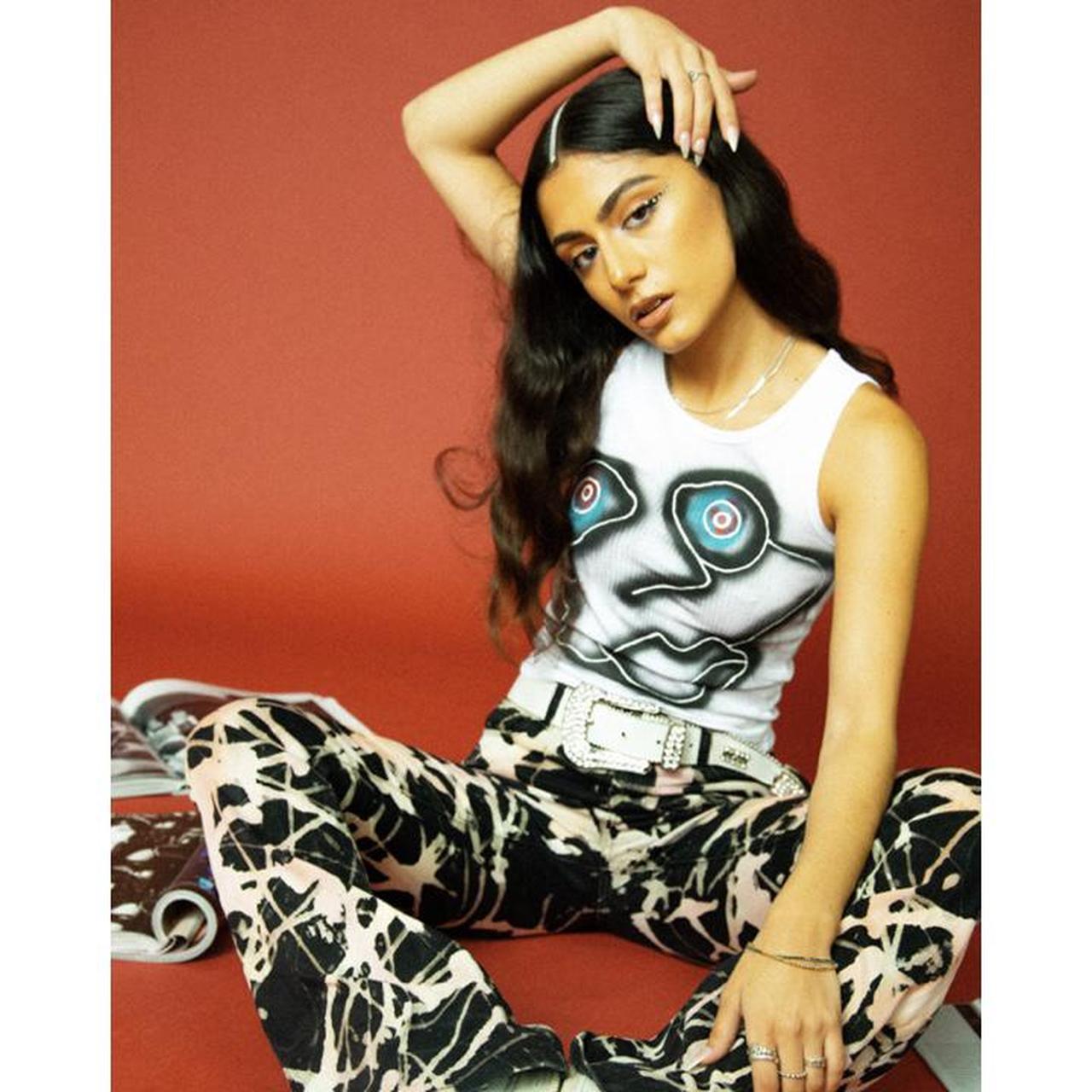 Spray paint and detail vest top made with all fabric... Depop