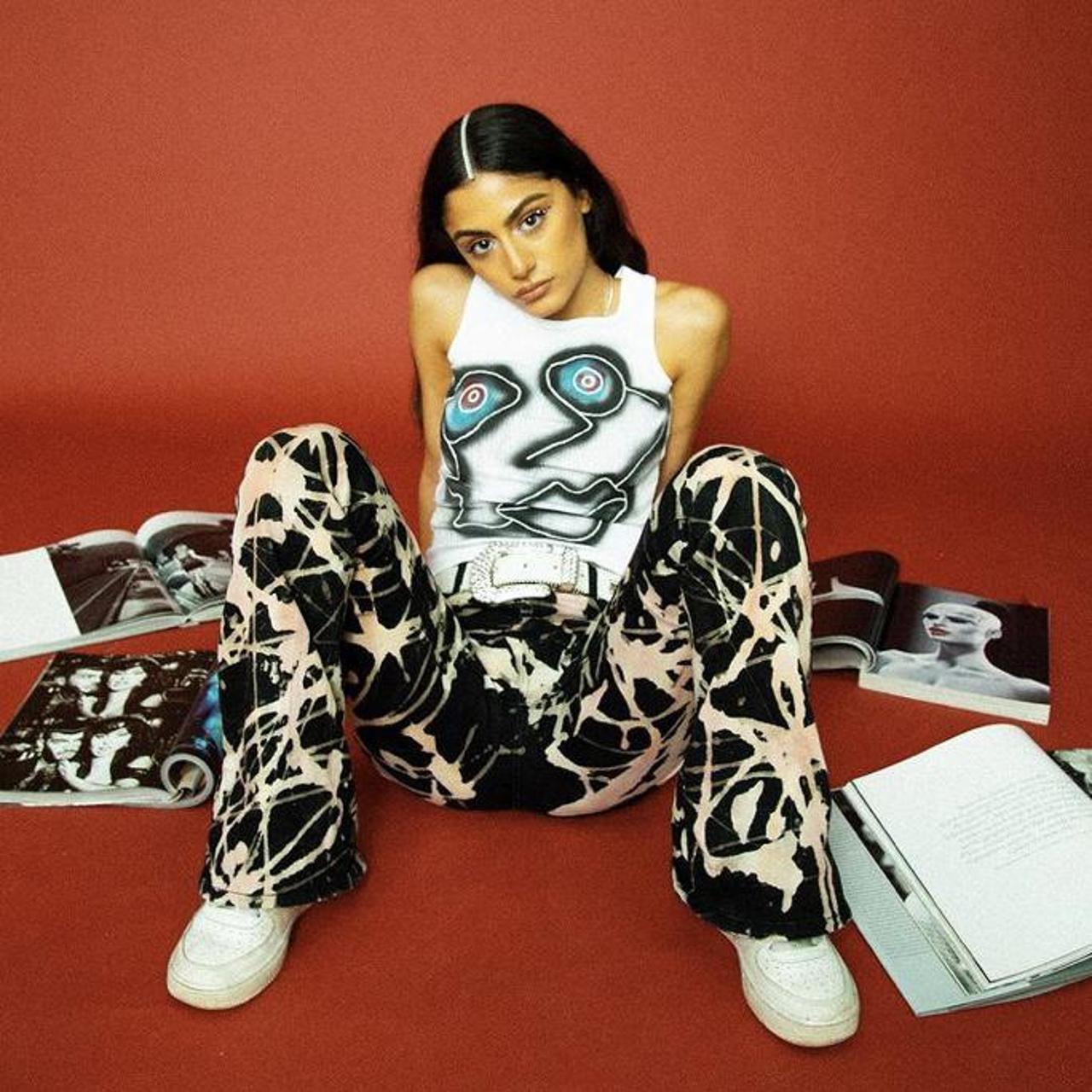 Spray paint and detail vest top made with all fabric... Depop