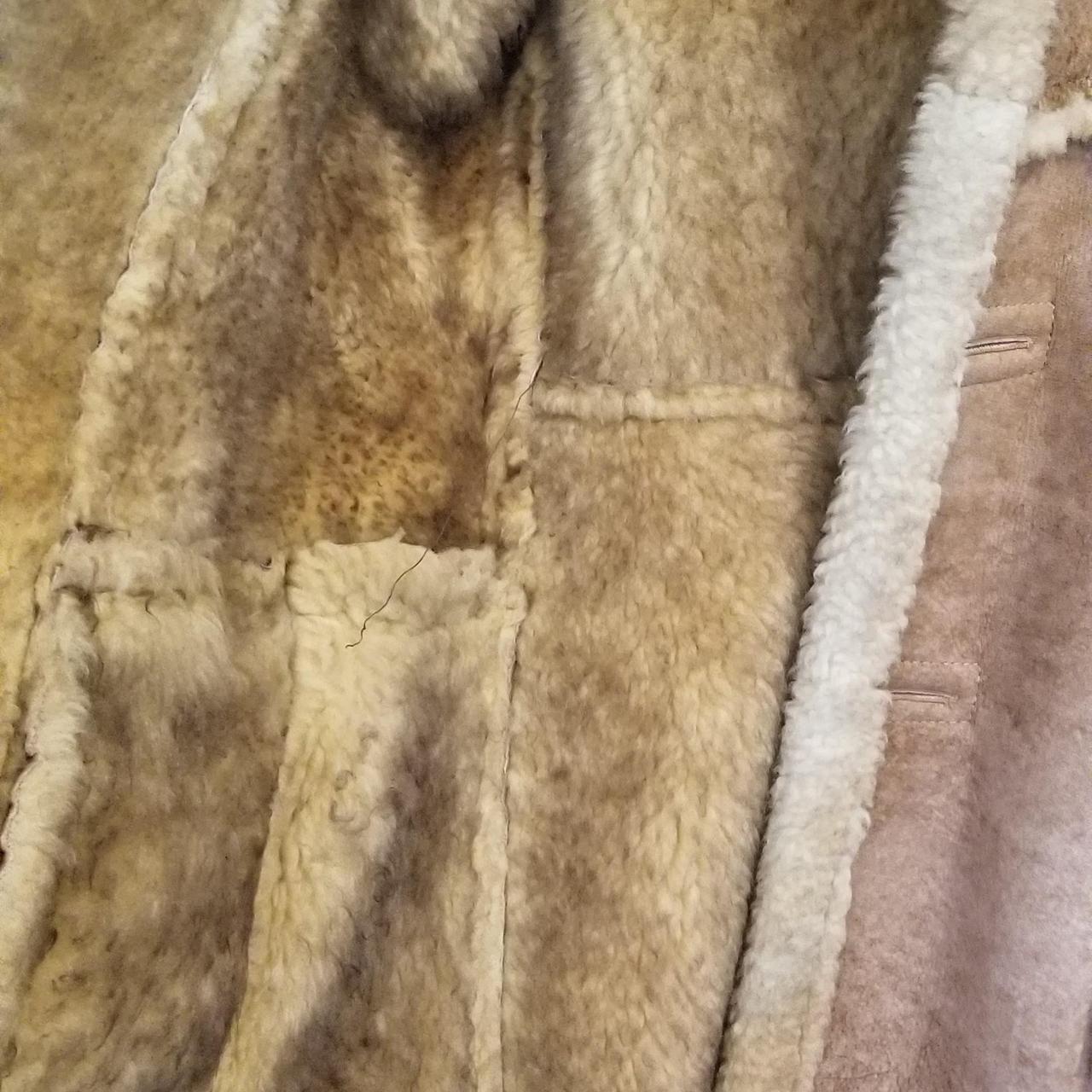 A men's tan shearling coat has some minor tears... - Depop