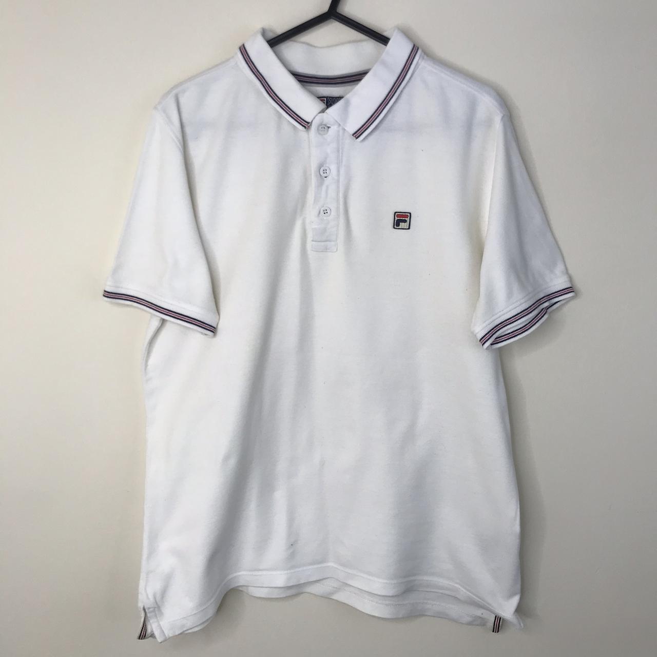 Vintage white Fila polo shirt. 3 buttons, white line... - Depop