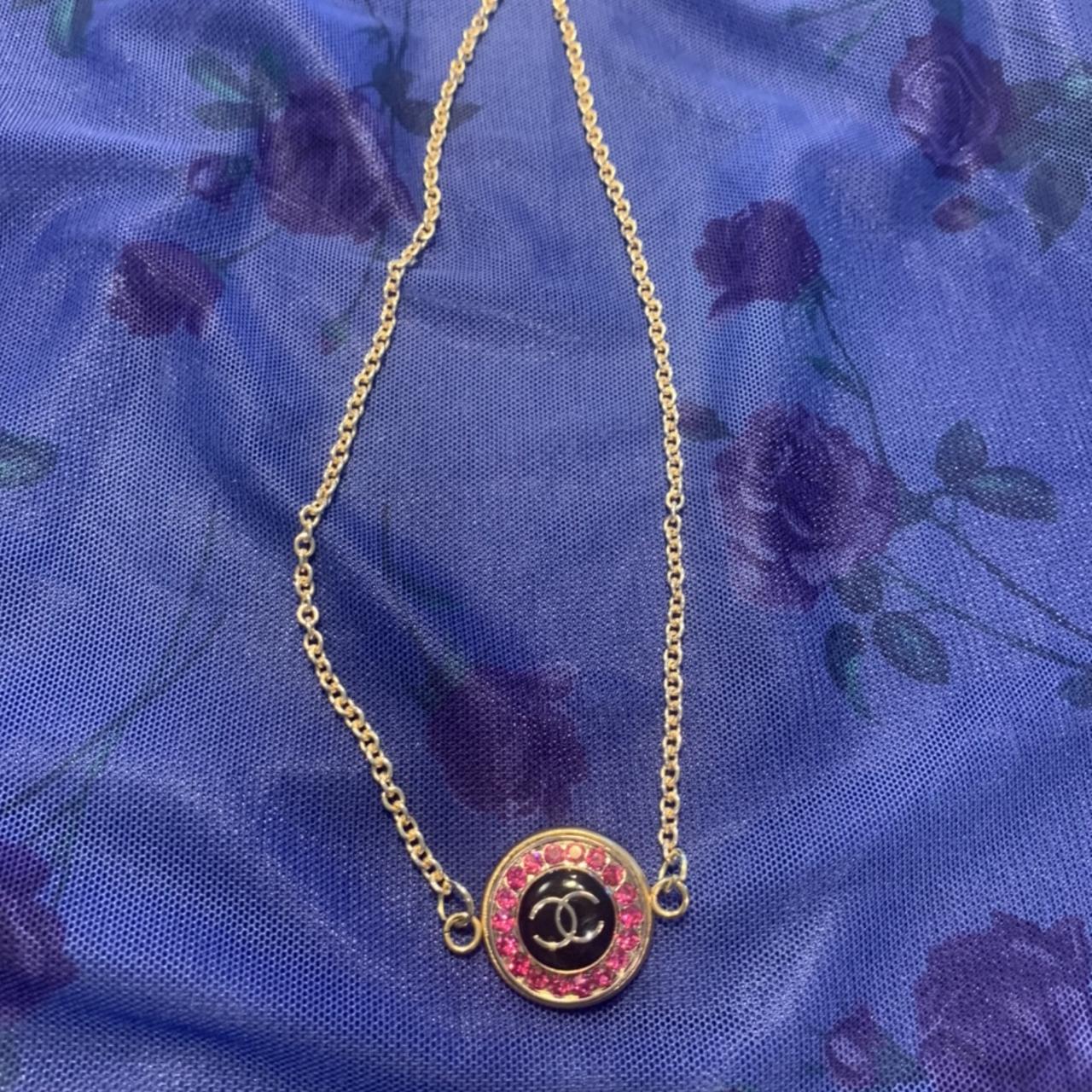 Pink black and gold repurposed Chanel button - Depop