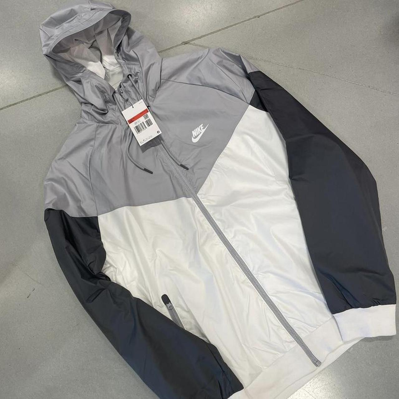 black grey and white nike windbreaker