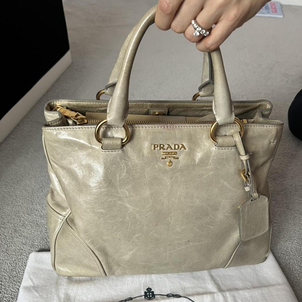 Prada Genuine Leather Bag with straps coming with a