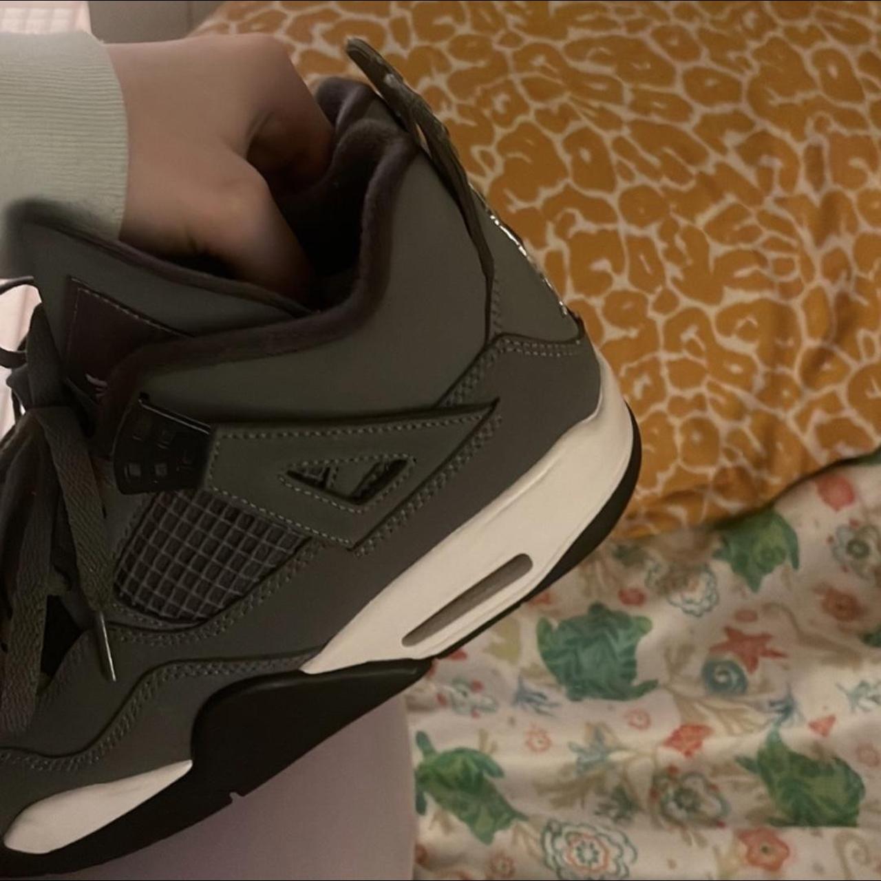 grey jordan 4's