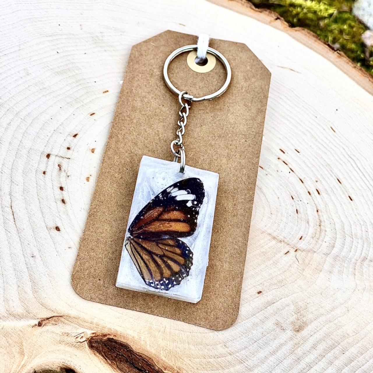 Cute butterfly attached gold resin keychain- Craftsi