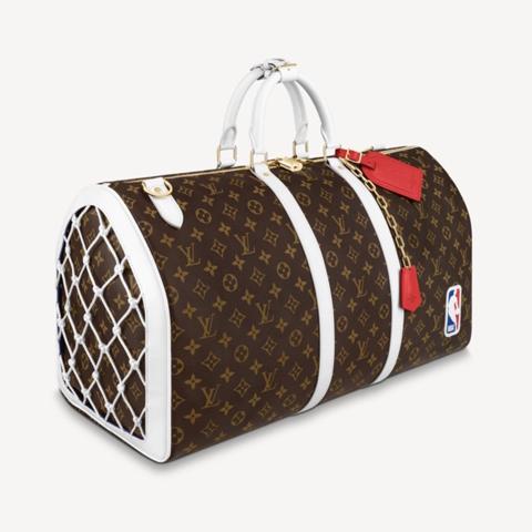 A LIMITED EDITION WHITE MONOGRAM CANVAS NBA BASKETBALL KEEPALL WITH GOLD  HARDWARE