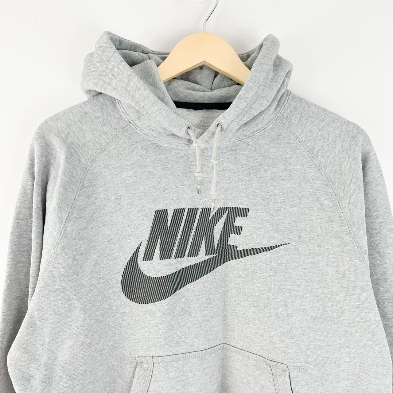 Nike graphic logo hoodie Appears to fit like a... - Depop