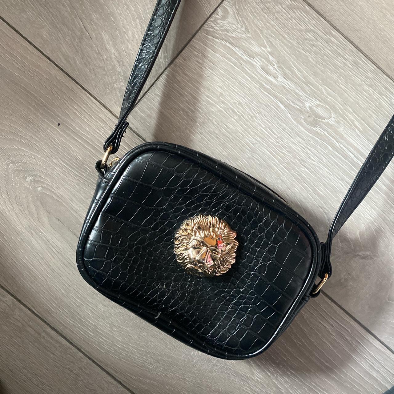 Gold lion online bag