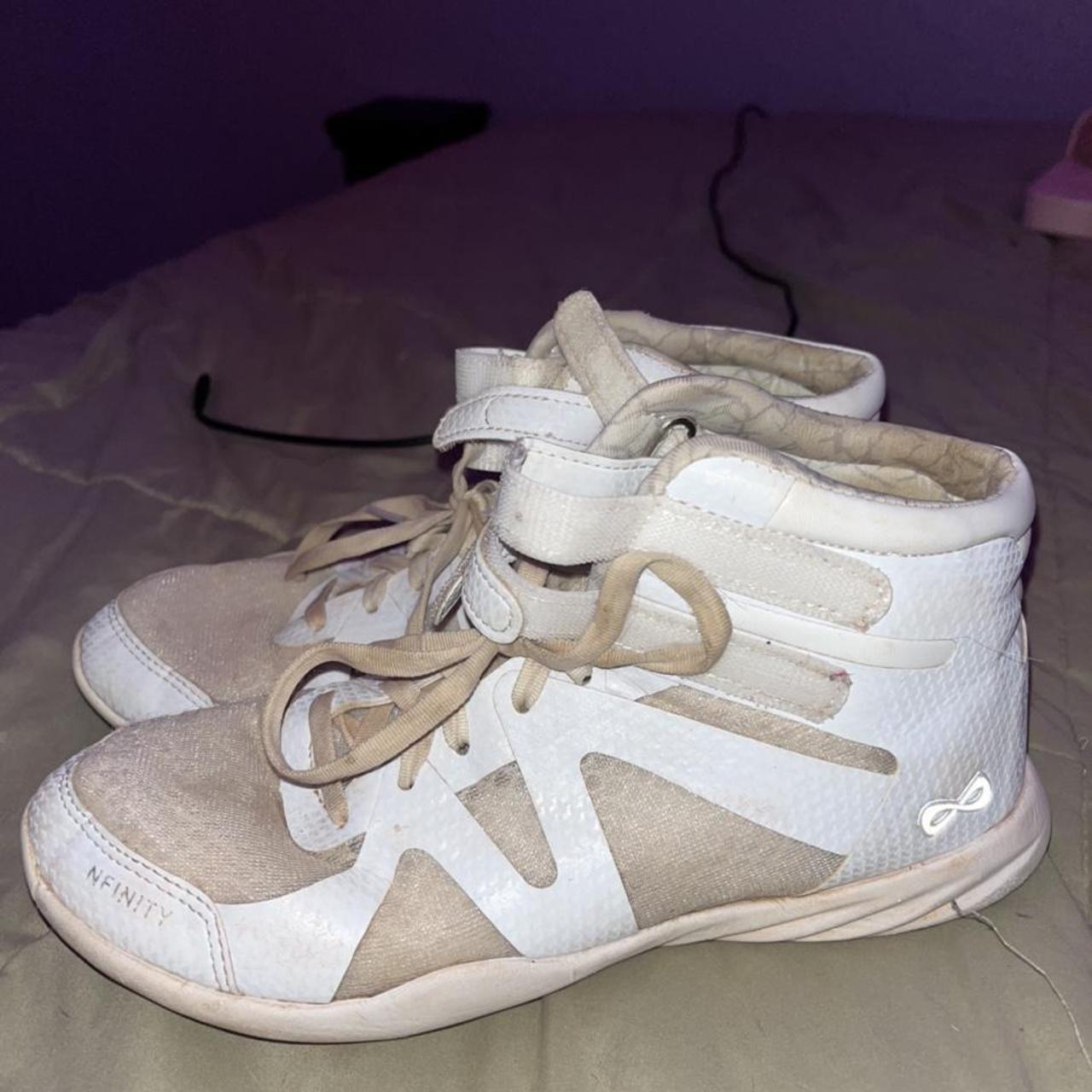 nfinity beast cheer shoes! still in good condition... Depop