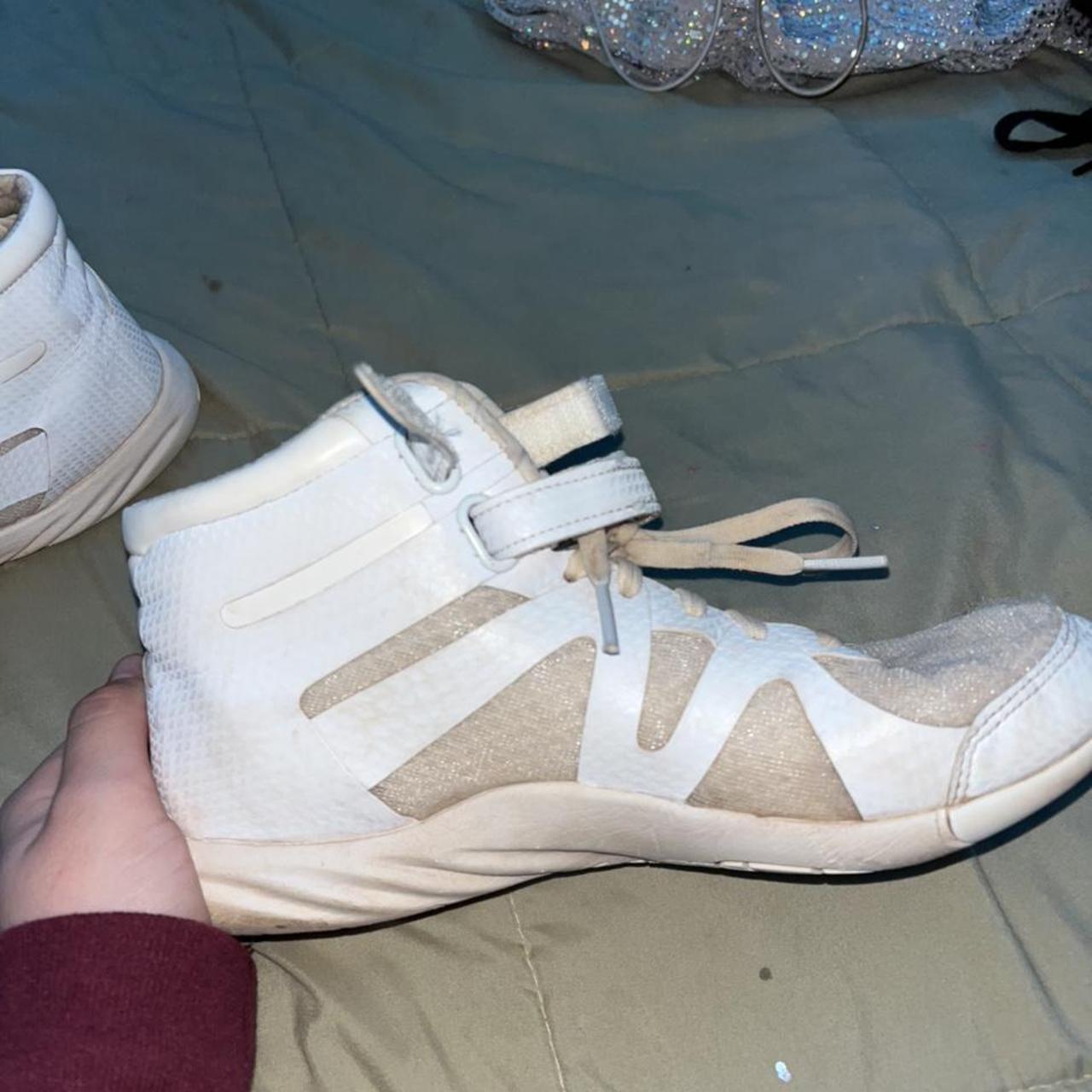 nfinity beast cheer shoes! still in good condition... Depop