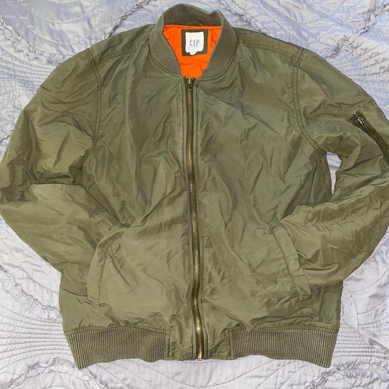 Olive green bomber deals jacket with orange inside