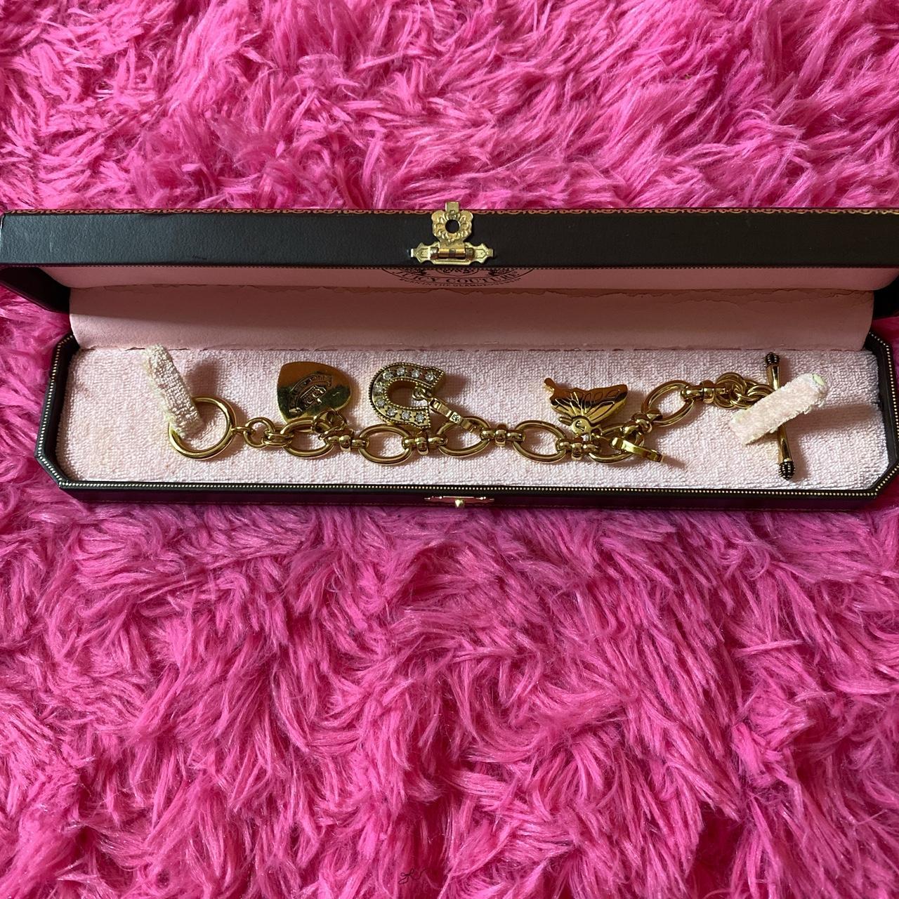 Juicy Couture Jewelry Gold charm bracelet with - Depop