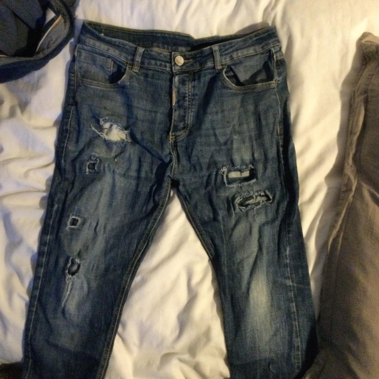 Alessandro Zavetti ripped jeans with small