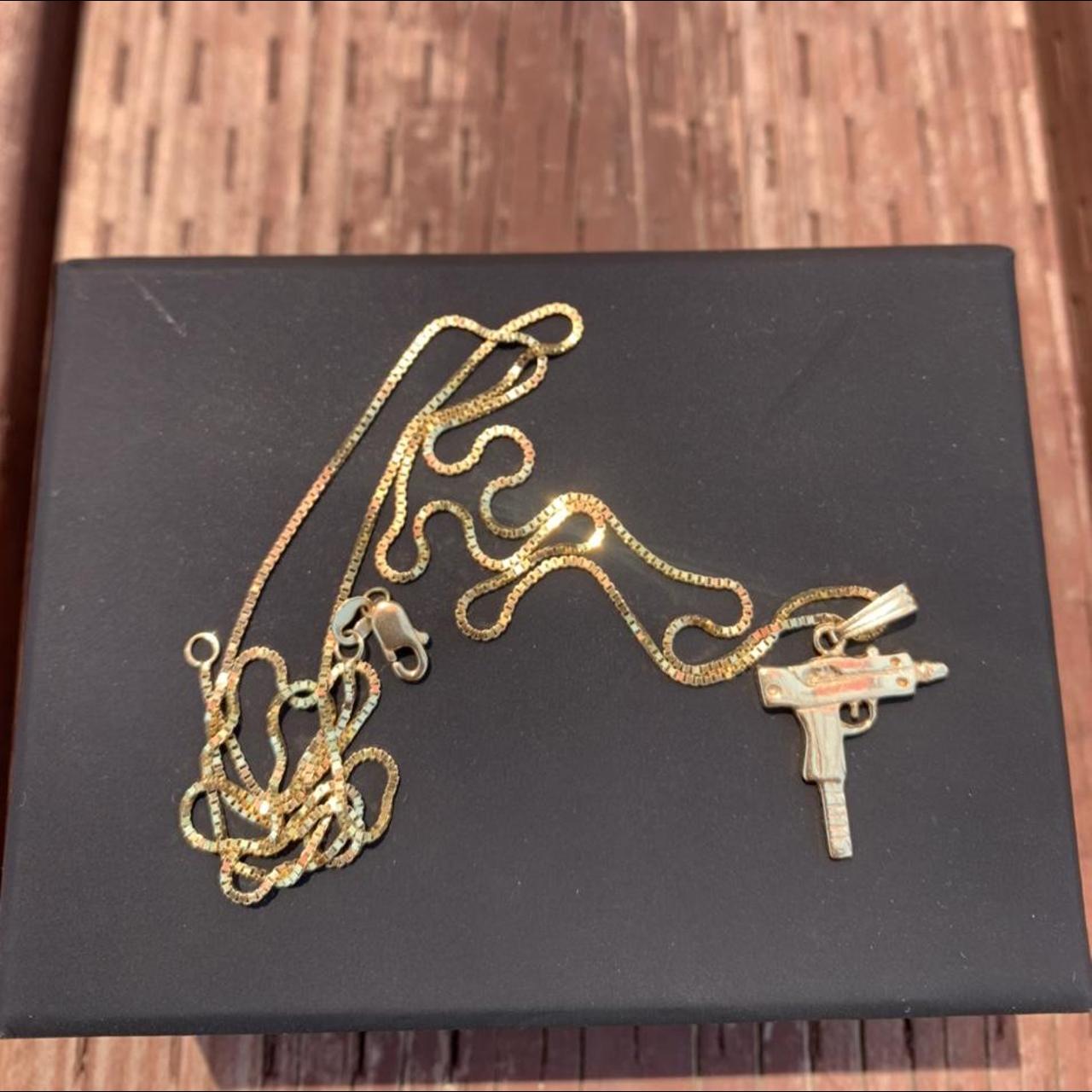 Supreme Gold Uzi Chain Gently used. From a | Depop