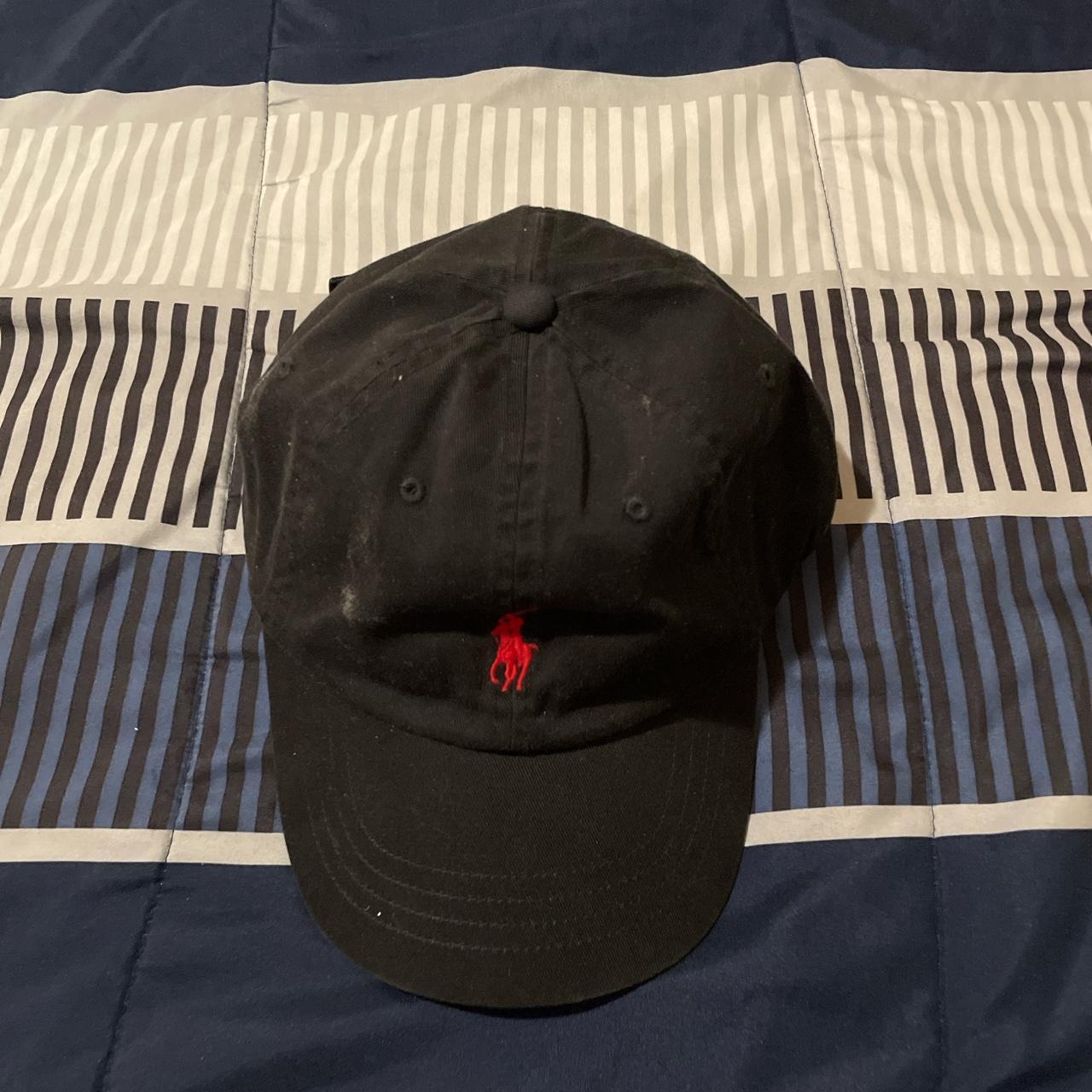 black red polo hat