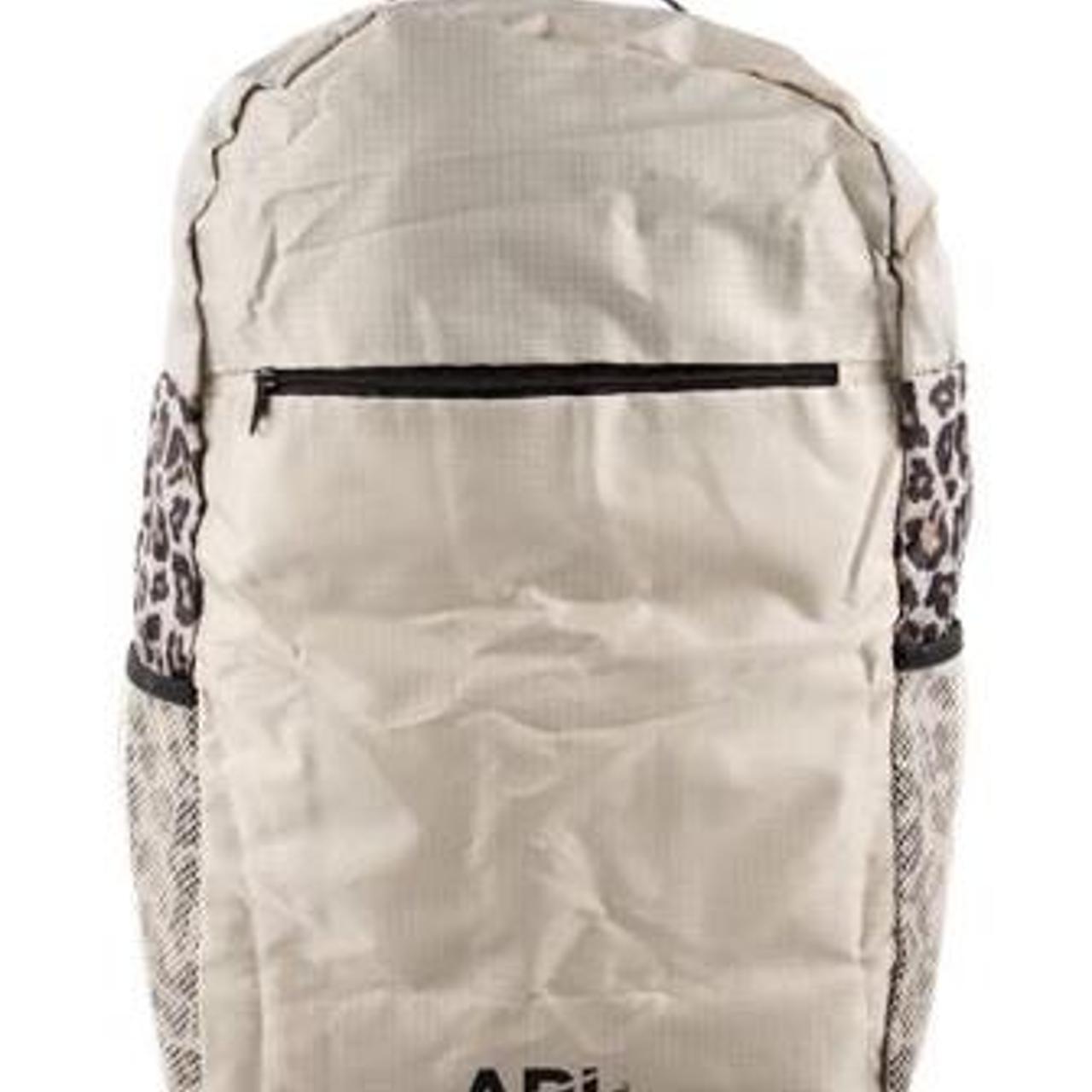 APL nylon backpack that can pack down. Super Depop