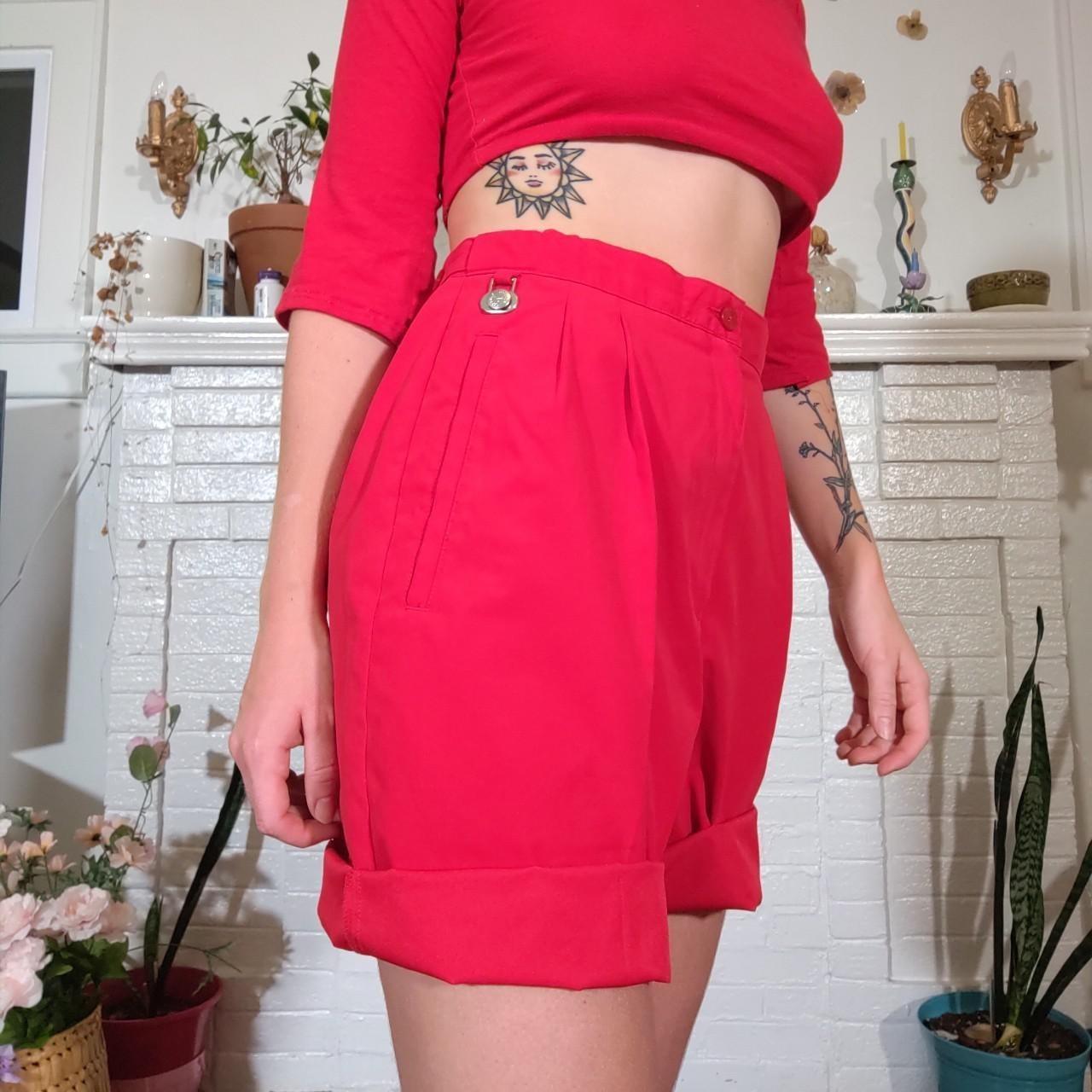 Red pleated shorts with cute charm and adjustable... Depop