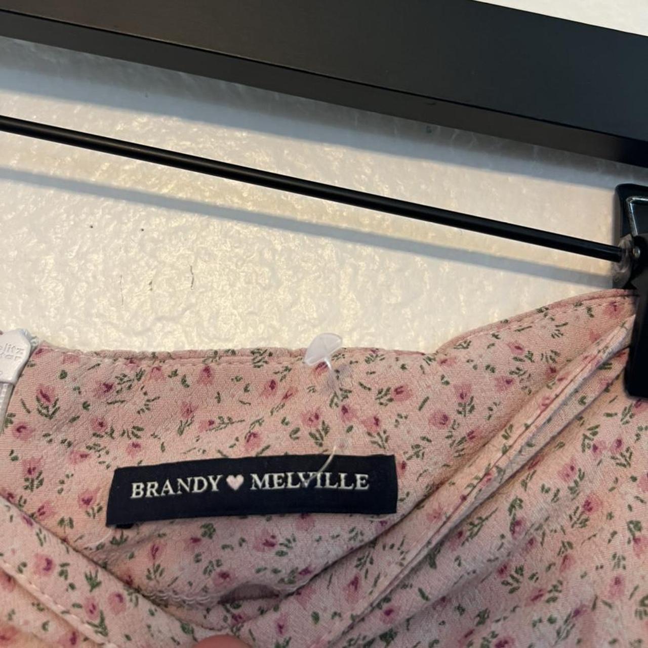 Brandy Melville pink floral skirt. Super cute with a... Depop