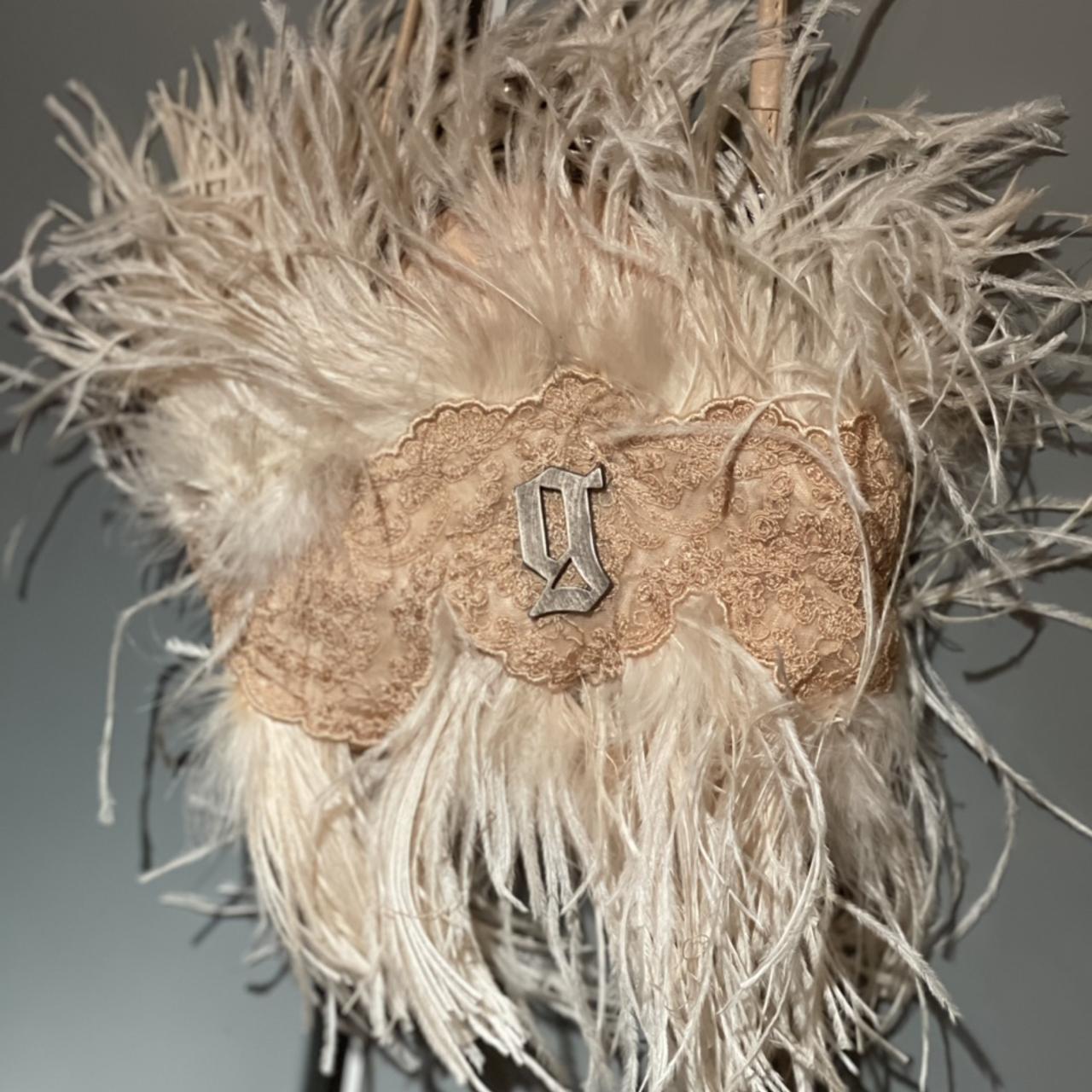 Borsetta rosa cipria con piume di struzzo e Depop