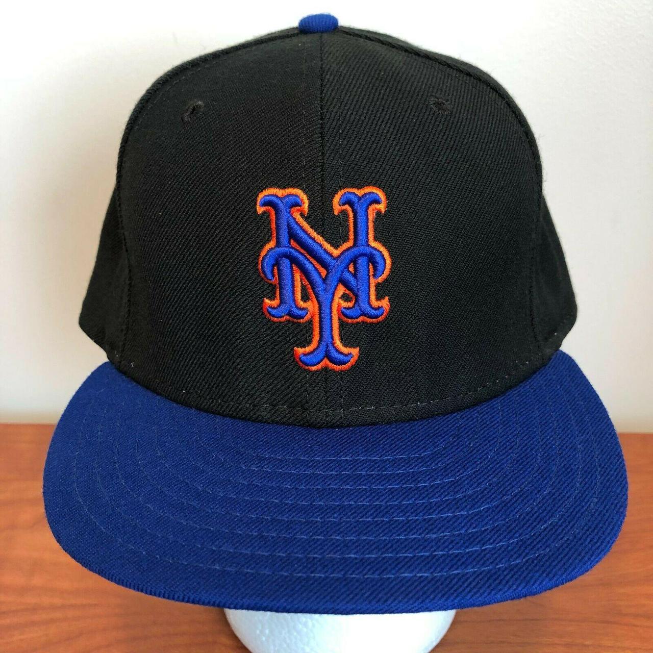 black mets hat with blue brim