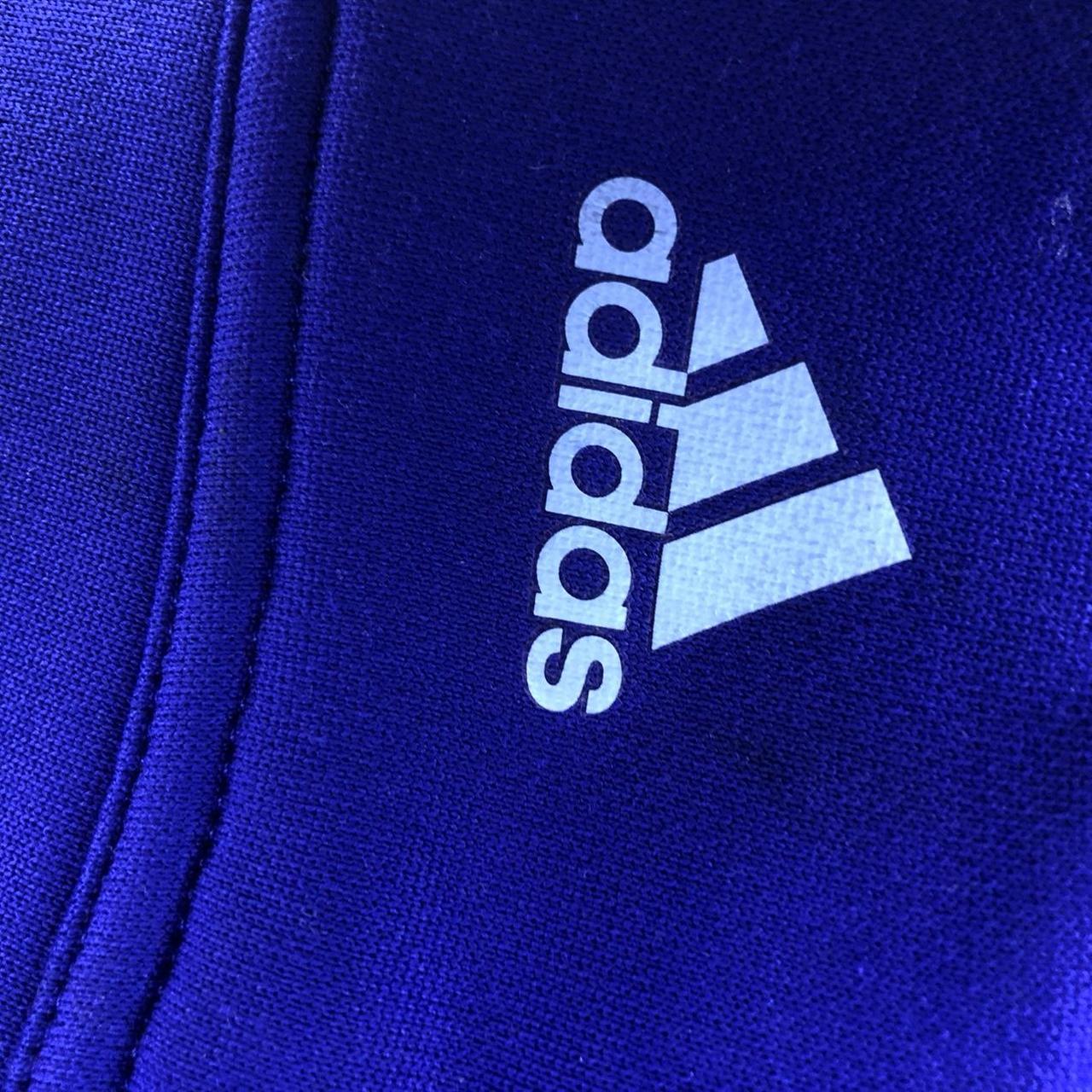 Purple and white adidas golf zip up size Child... Depop