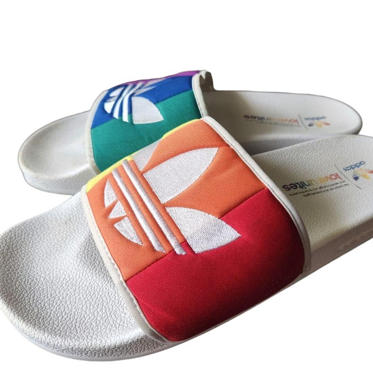 Love unites adidas online slides