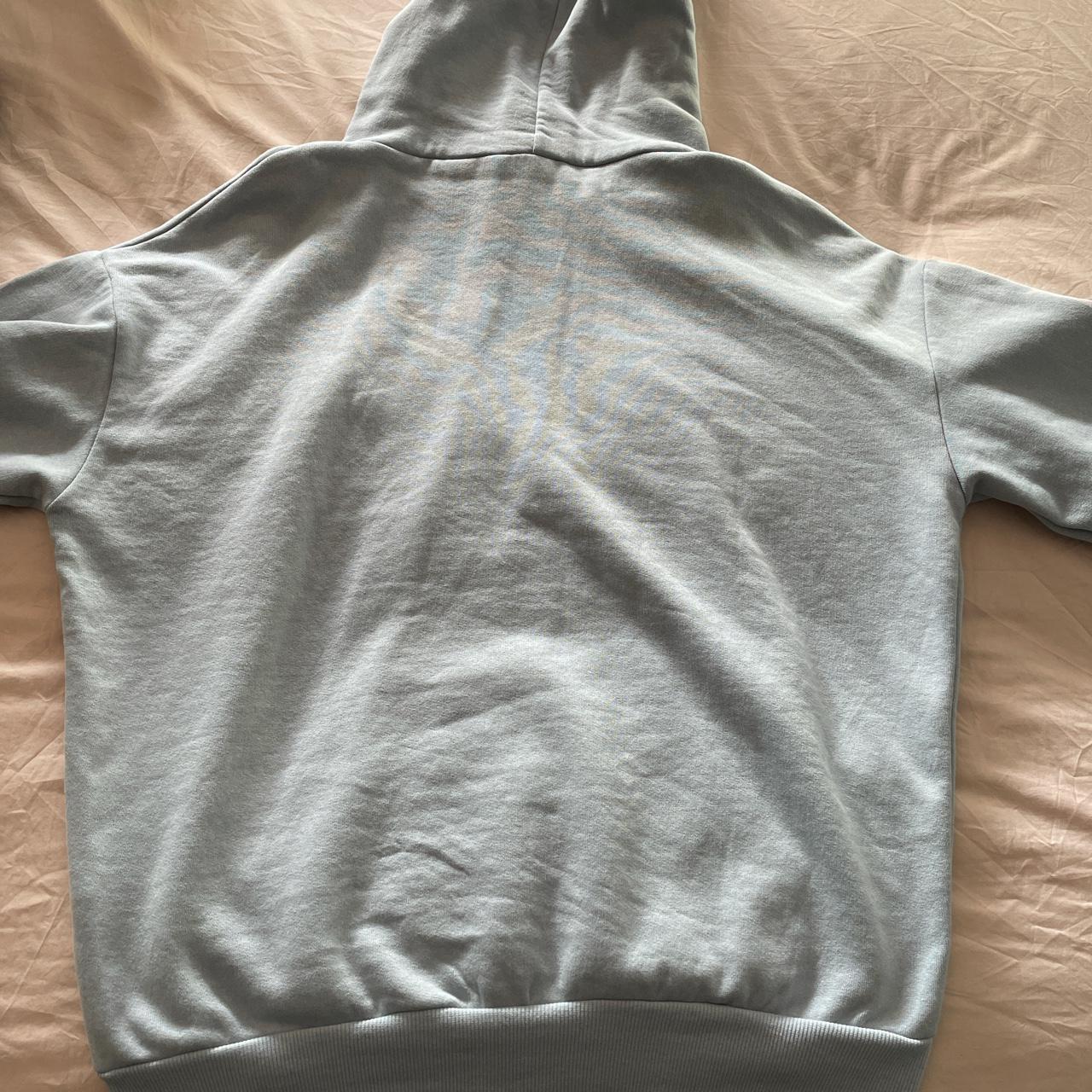 Light Blue hoodie with graphic car design From... - Depop