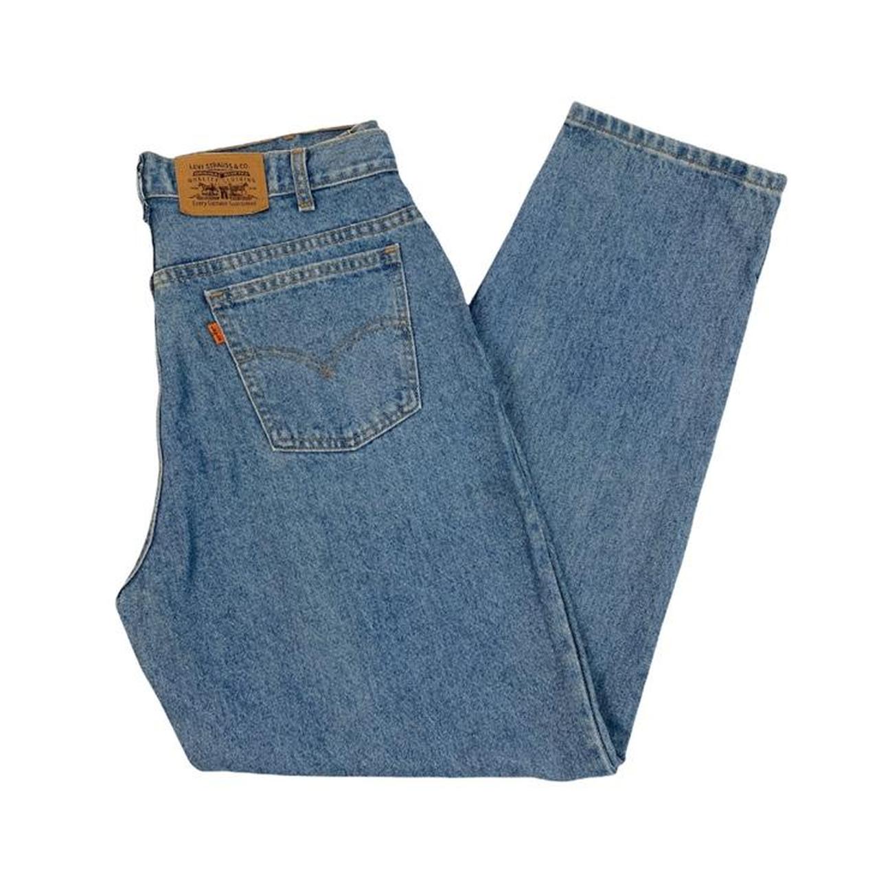 Vintage Levi’s orange tab Jeans in a light blue... - Depop
