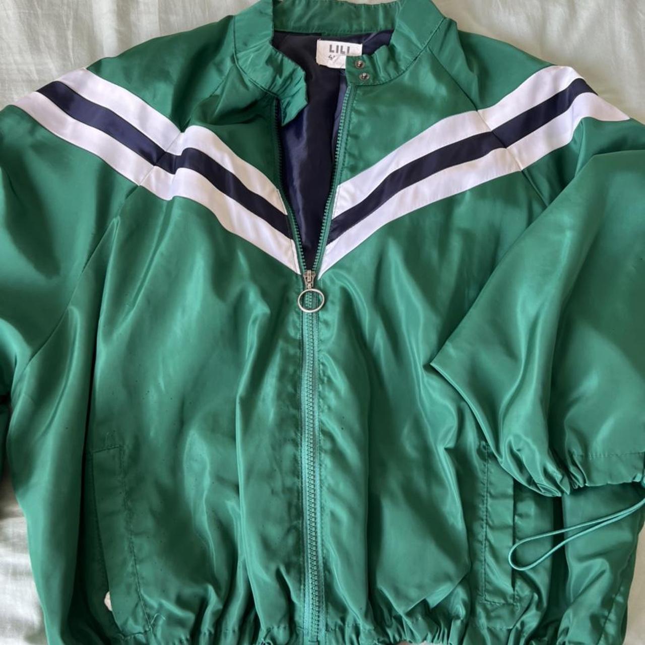 Green Windbreaker There’s some paint spots all over... - Depop