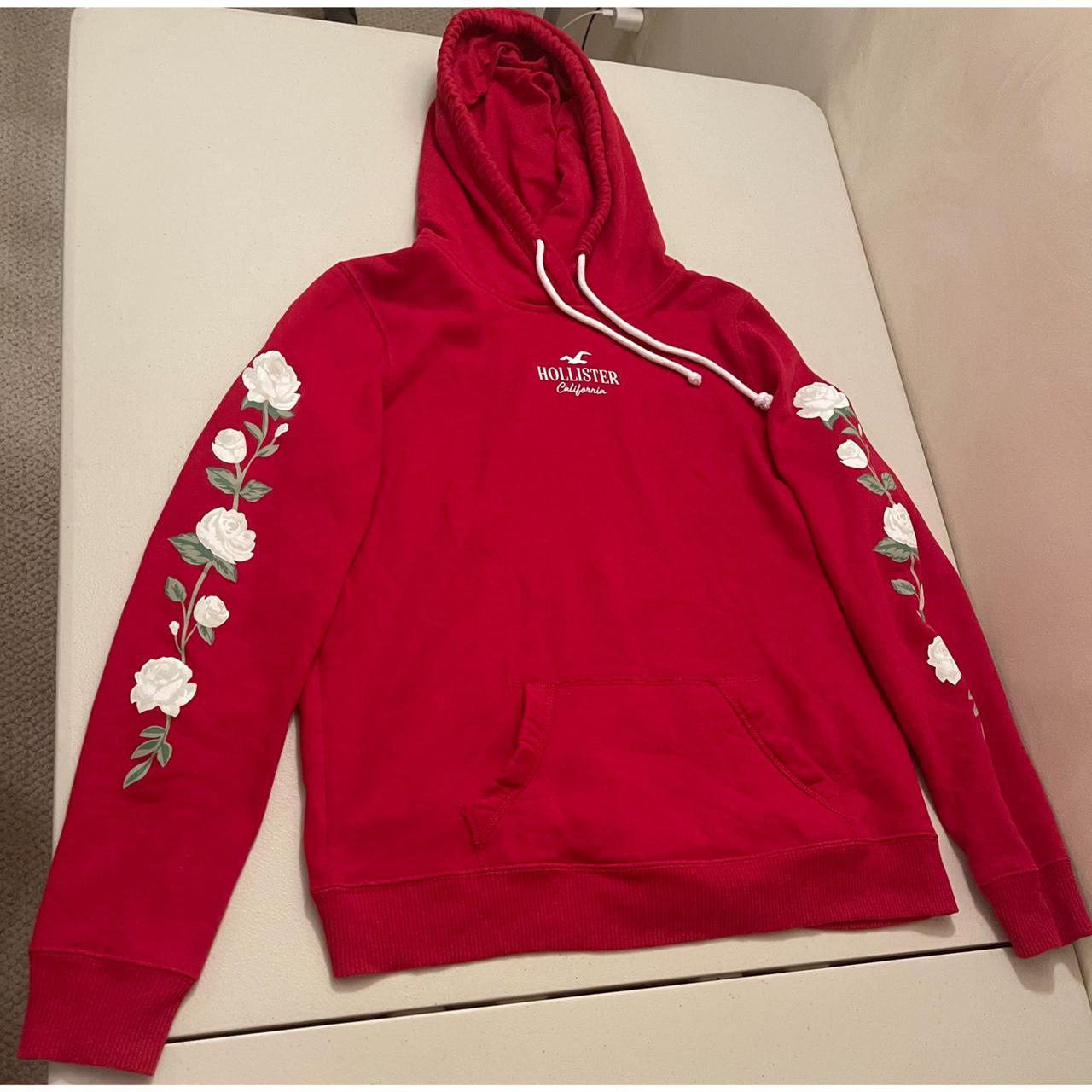 Comfy red Hollister hoodie with white roses down